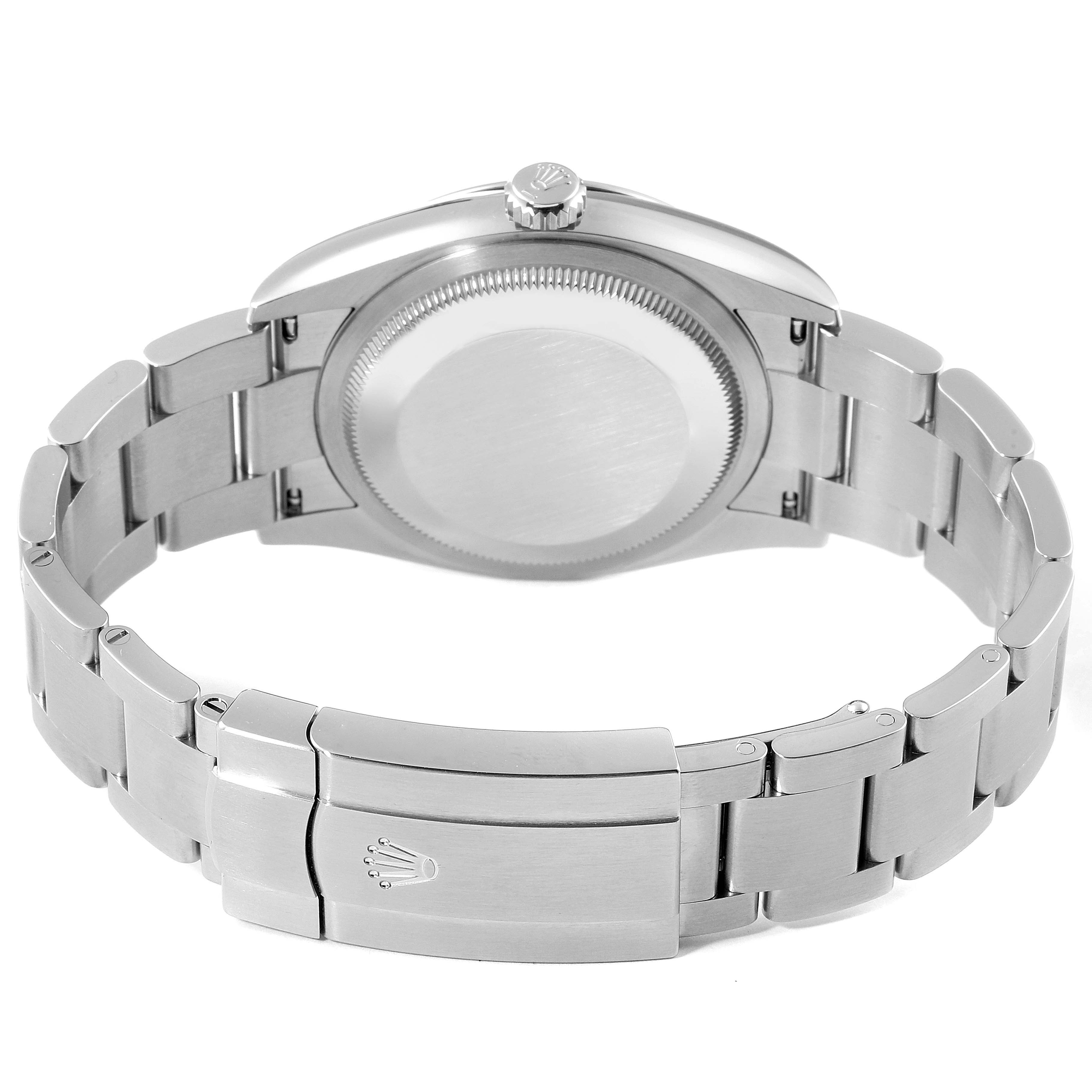 This image shows the back case, bracelet, and clasp of a Rolex Oyster Perpetual 126000 Men's Stainless Steel Red Dial 126000 Men's Stainless Steel Red Dial watch at a slight angle.