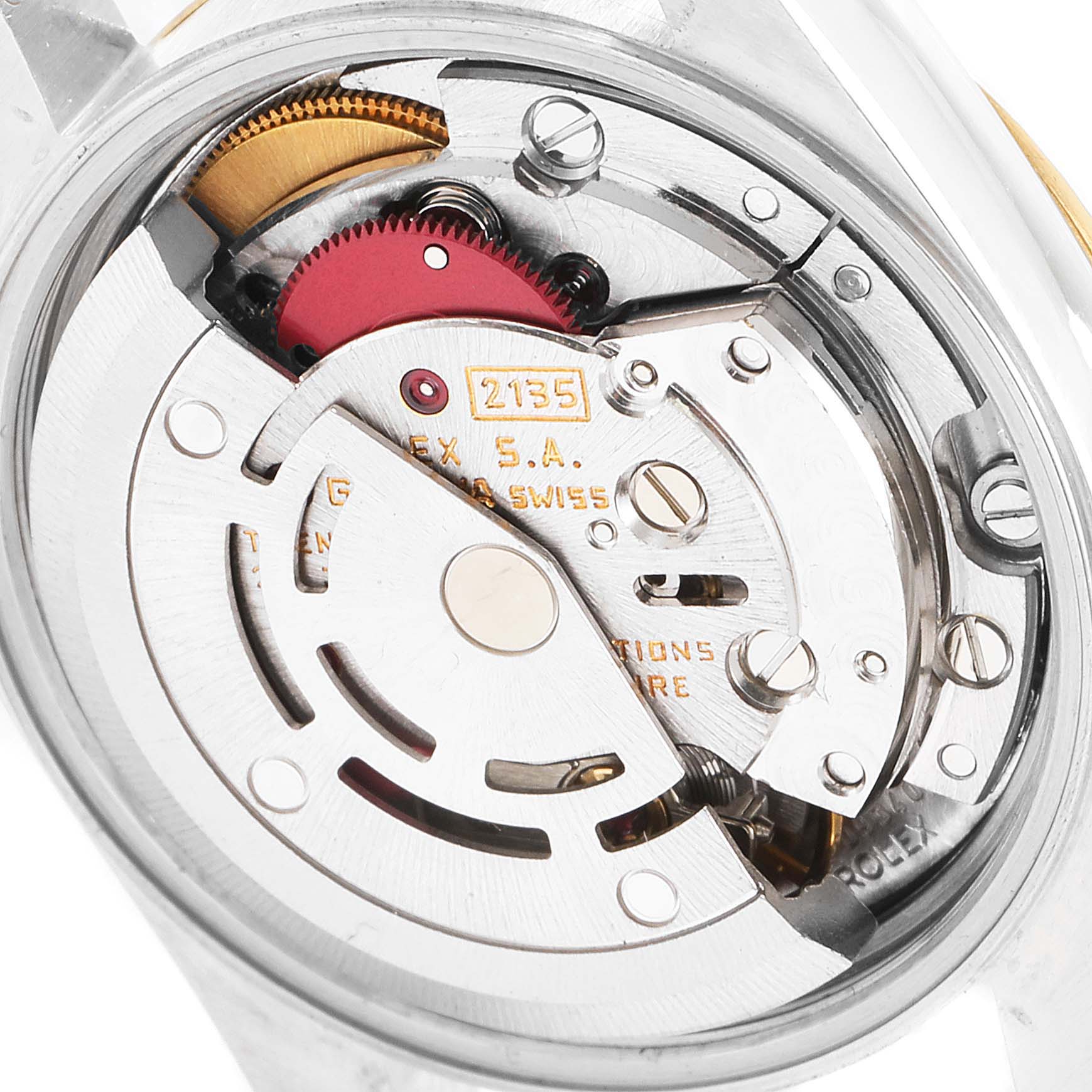 The image shows the internal mechanical movement components of a Rolex Oyster Perpetual 67193 Women
s Steel and Gold (two tone) Champagne Dial 67193 Women
s Steel and Gold (two tone) Champagne Dial watch.