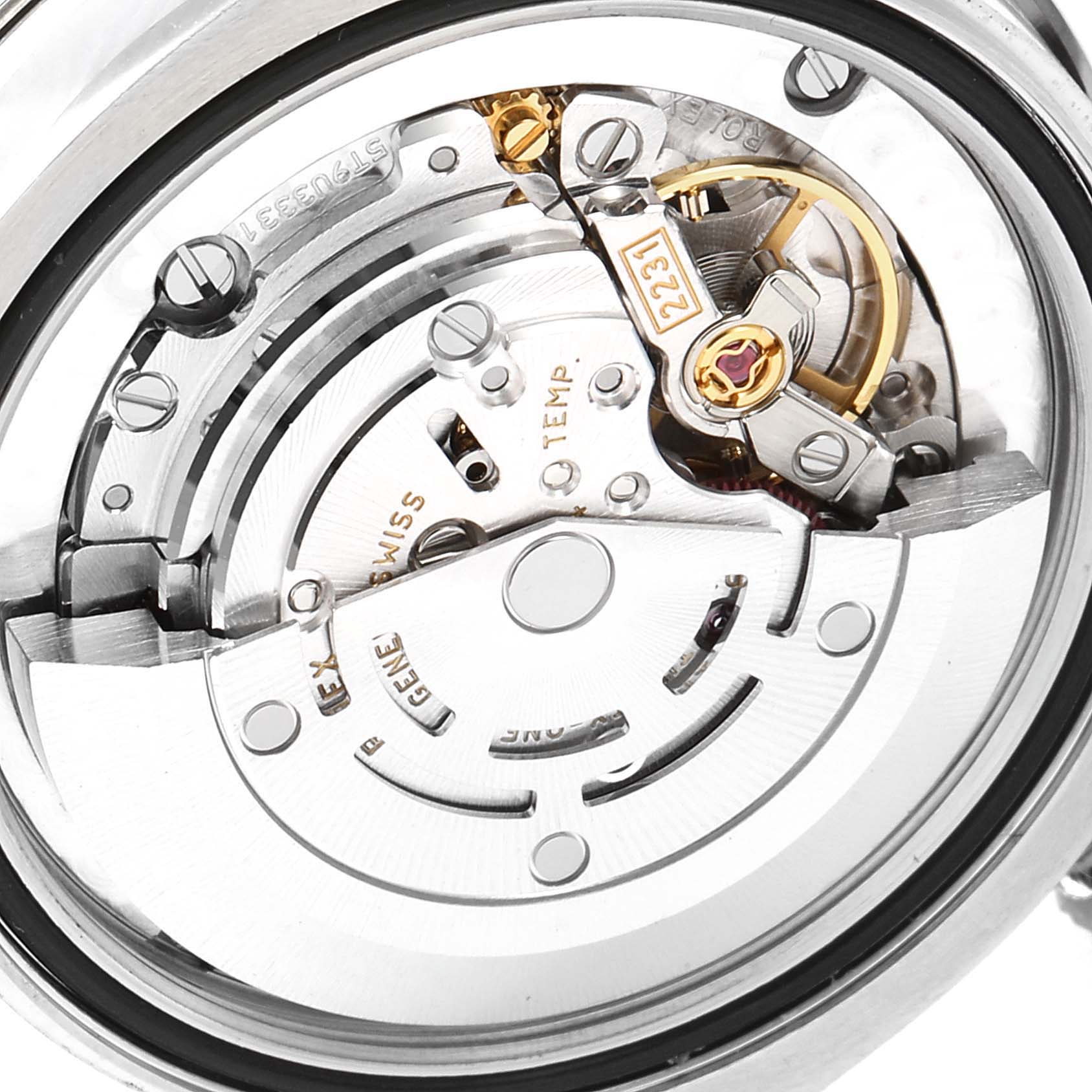 This image shows the internal movement mechanism of a Rolex Mid-Size 177200 Women's Stainless Steel Grey Dial 177200 Women's Stainless Steel Grey Dial watch from a close-up, rear angle. 