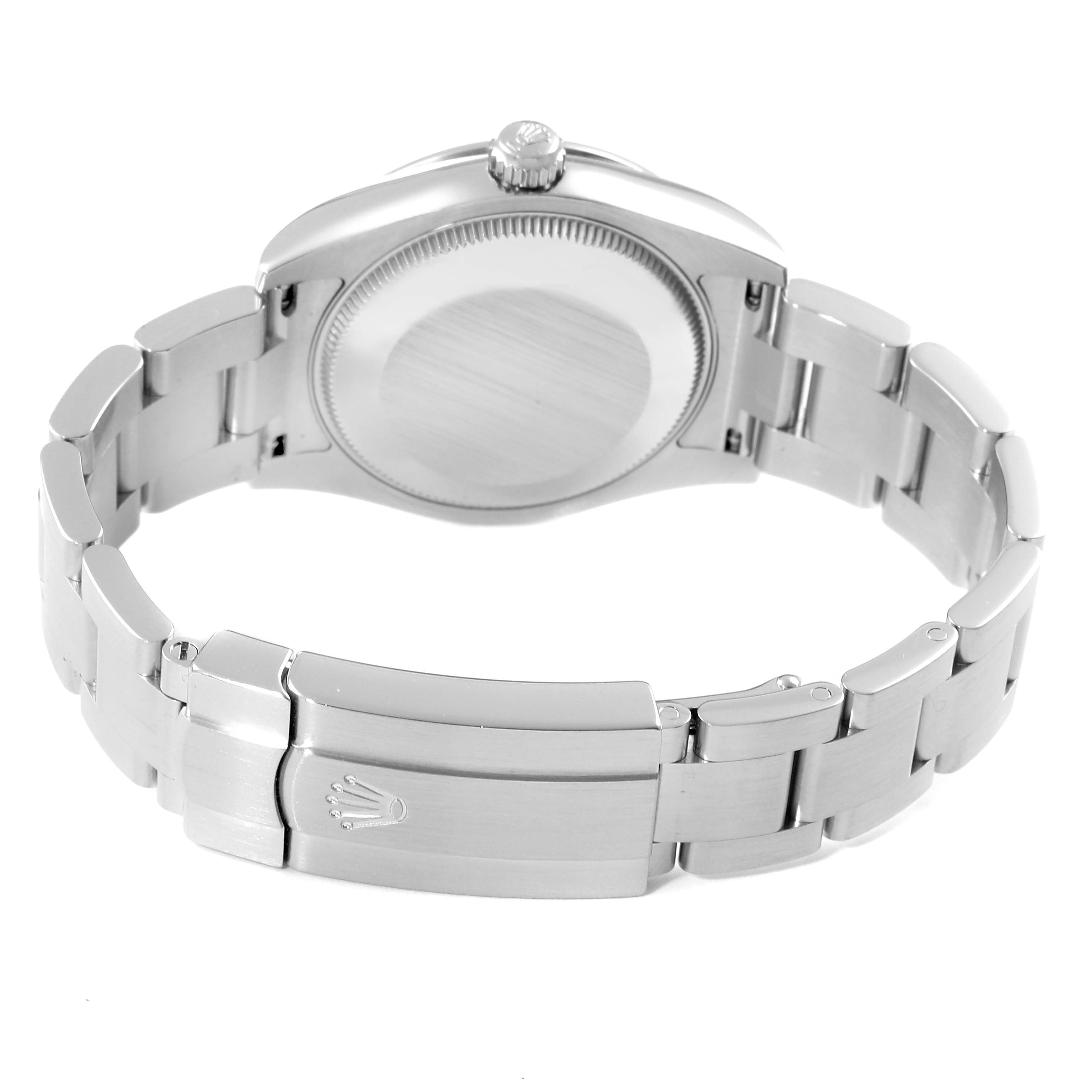 The image shows the back of the Rolex Mid-Size 177200 Women
s Stainless Steel White Dial 177200 Women
s Stainless Steel White Dial model watch, highlighting the case back, crown, and bracelet with the Rolex clasp.