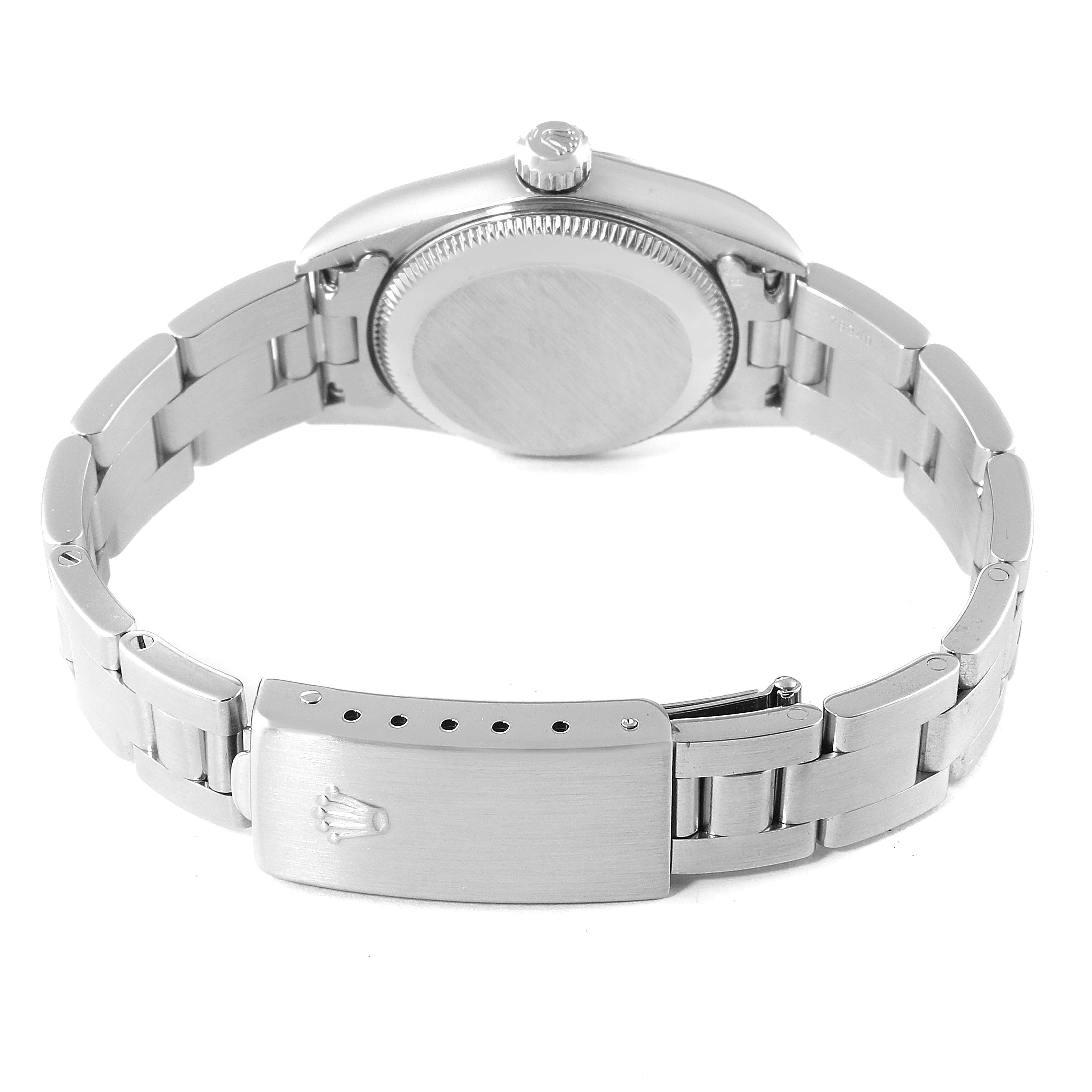 The image shows the back view of a Rolex Oyster Perpetual 76080 Women's Stainless Steel Silver Dial 76080 Women's Stainless Steel Silver Dial watch, focusing on the case back, bracelet, and clasp.