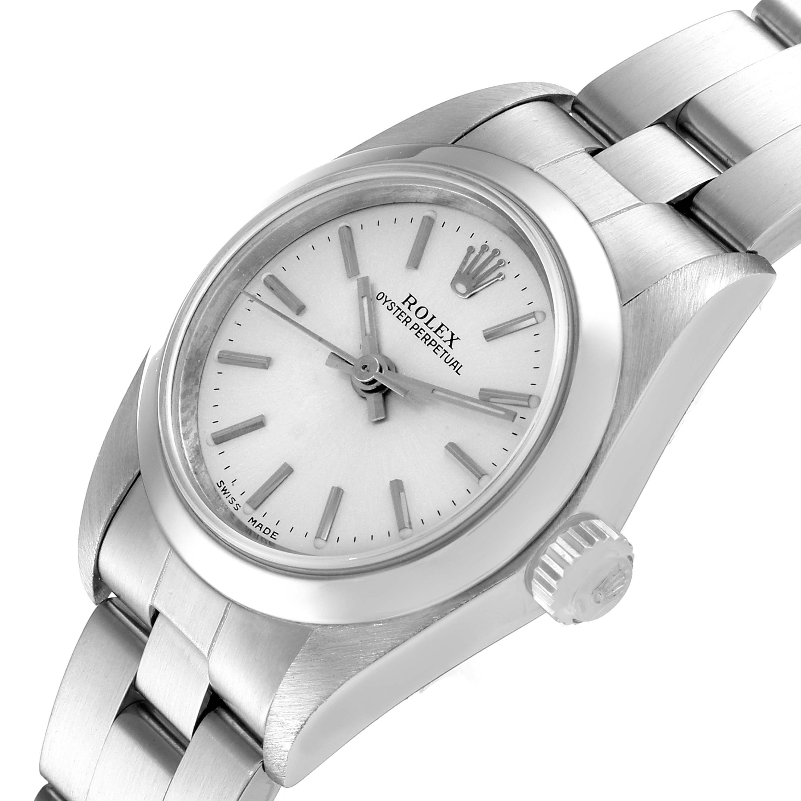 This is a top-side angle view of a Rolex Oyster Perpetual 76080 Women's Stainless Steel Silver Dial 76080 Women's Stainless Steel Silver Dial watch showing its dial, crown, and part of the bracelet.