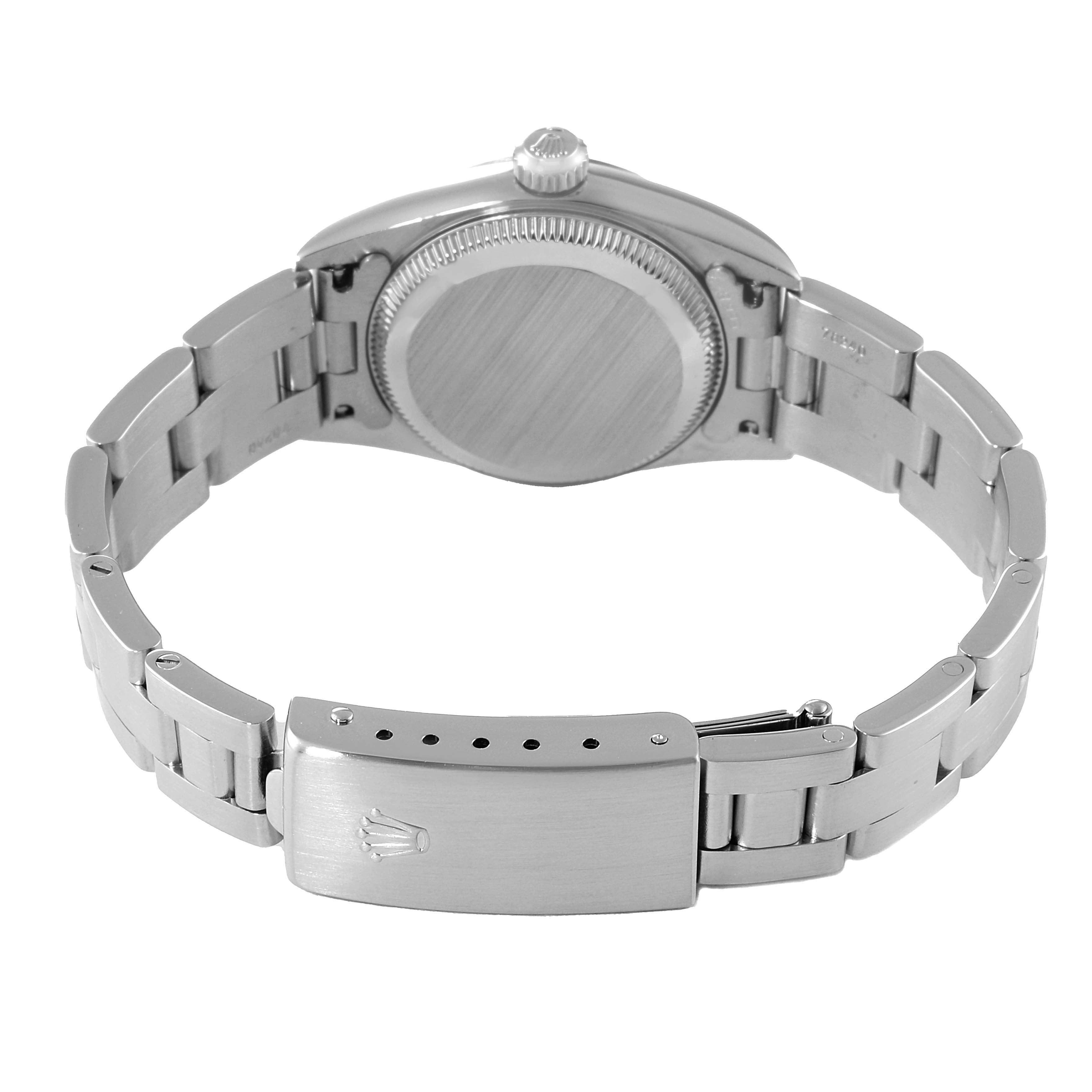 This image shows the back of a Rolex Oyster Perpetual 76080 Women
s Stainless Steel Silver Dial 76080 Women
s Stainless Steel Silver Dial watch, displaying its case back and clasp.