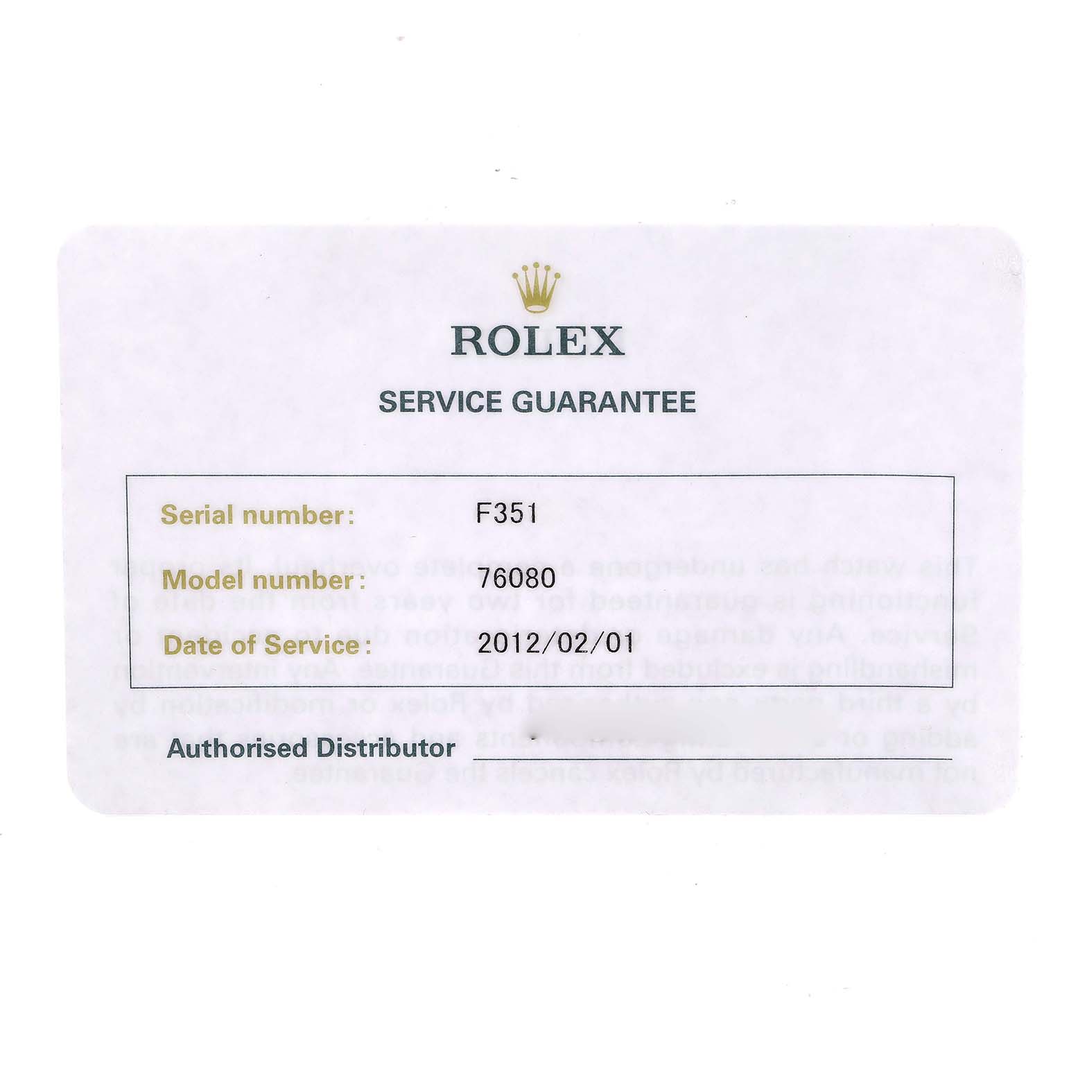 The image shows a service guarantee card for a Rolex Oyster Perpetual 76080 Women's Stainless Steel Silver Dial 76080 Women's Stainless Steel Silver Dial watch, displaying the serial and model number.