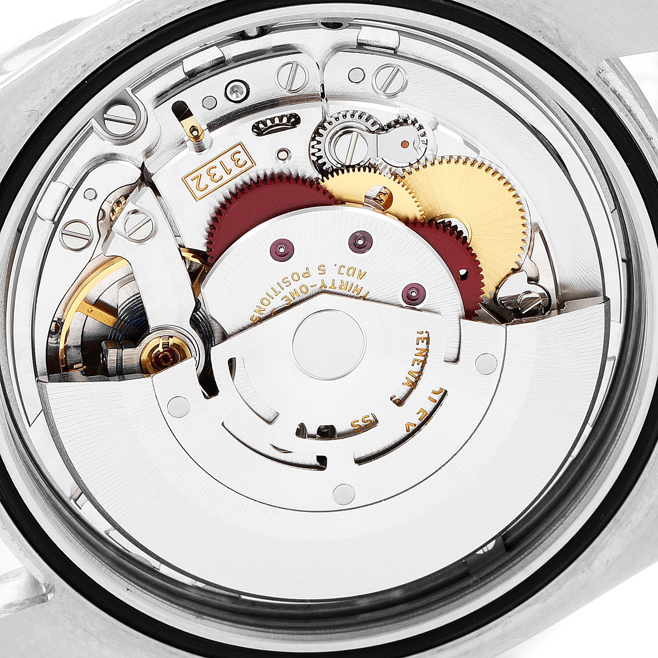 This image shows the internal movement mechanism of a Rolex Oyster Perpetual 114300 Men's Stainless Steel Burgundy Dial 114300 Men's Stainless Steel Burgundy Dial watch from the back view.