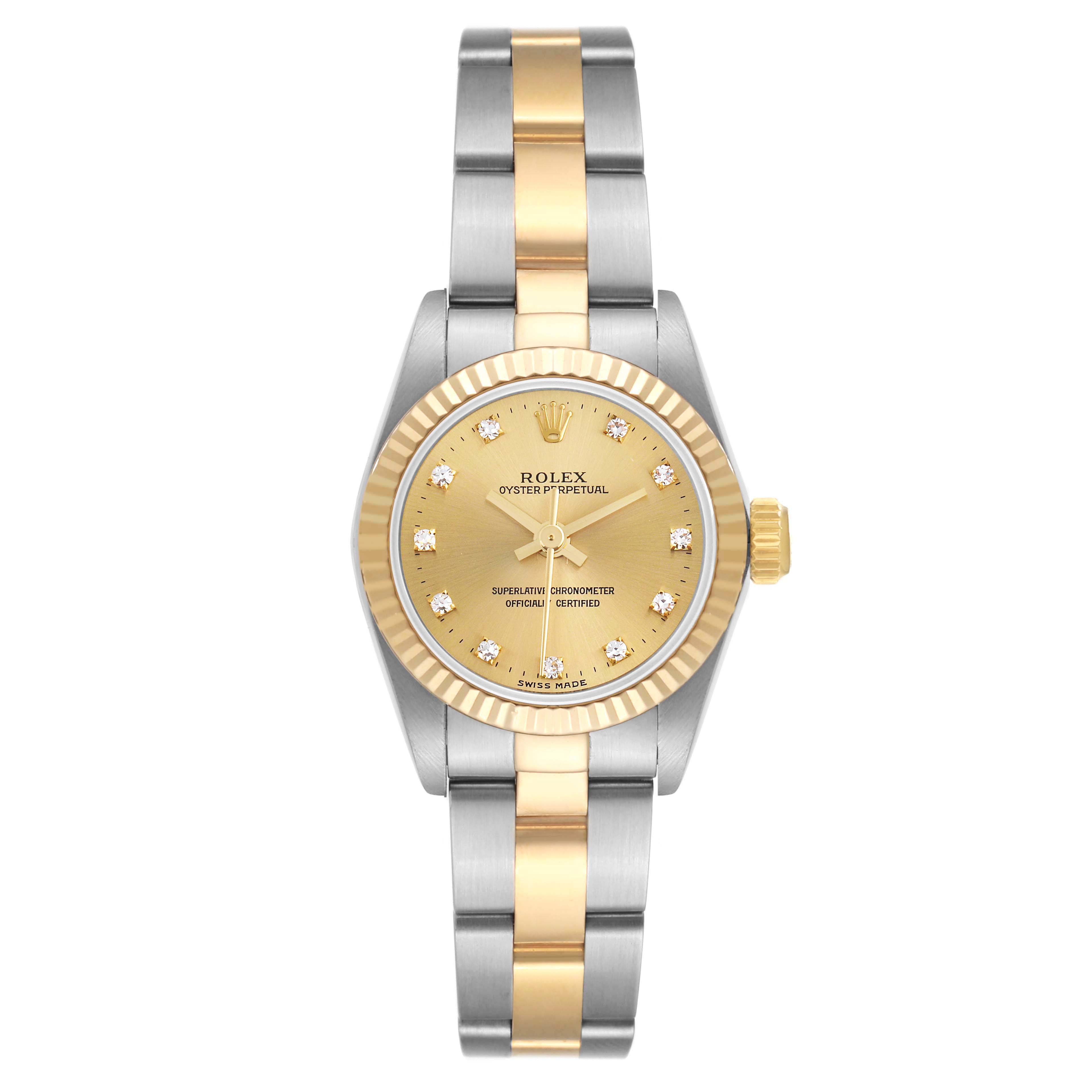 The Rolex Oyster Perpetual 67193 Women's Steel and Gold (two tone) Champagne Dial 67193 Women's Steel and Gold (two tone) Champagne Dial watch is shown from a top-down angle, highlighting the two-tone bracelet and diamond-accented gold dial.