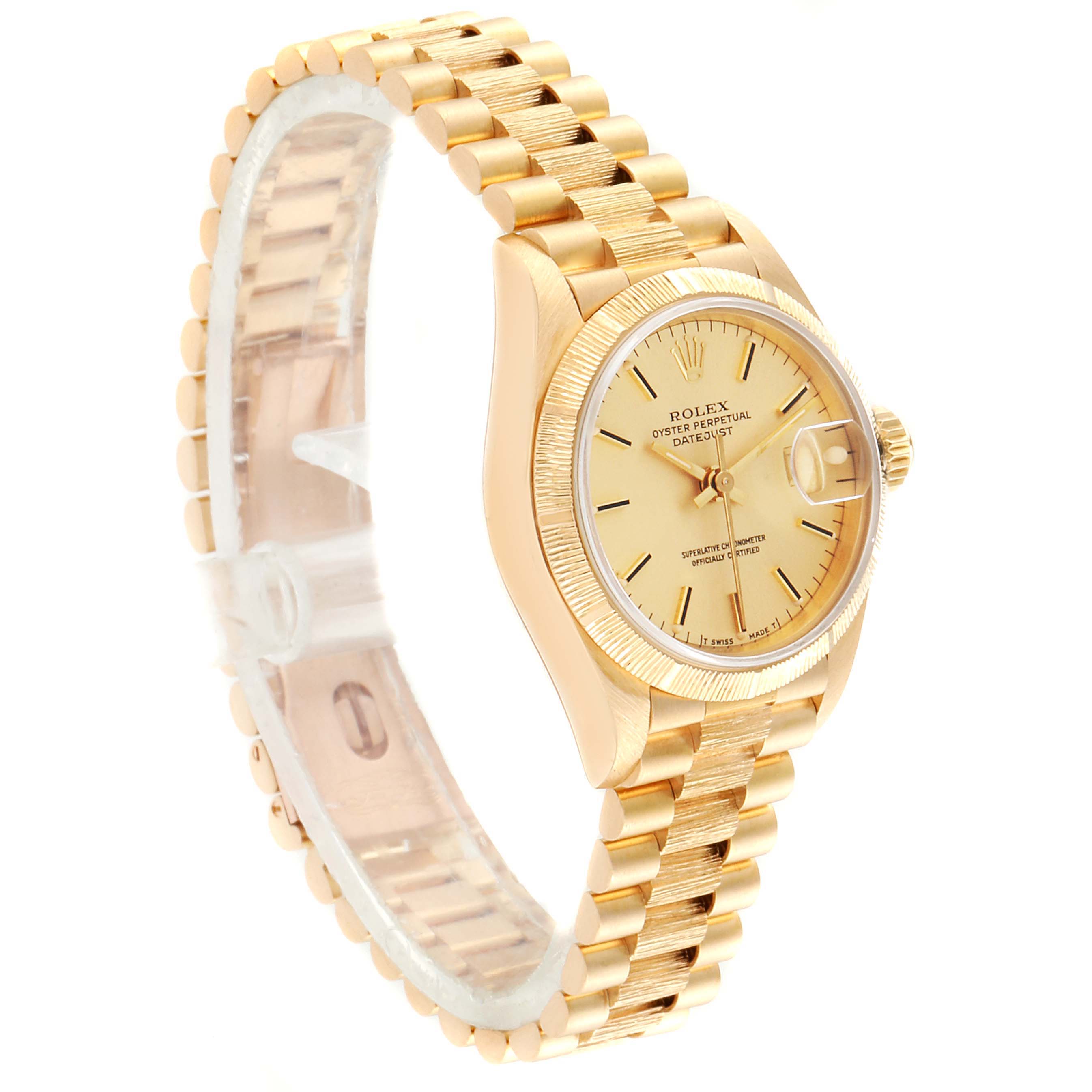 The Rolex President 69278 Women
s Yellow Gold Champagne Dial 69278 Women
s Yellow Gold Champagne Dial model watch is shown from a side angle and features the watch face, bracelet, and part of the clasp.