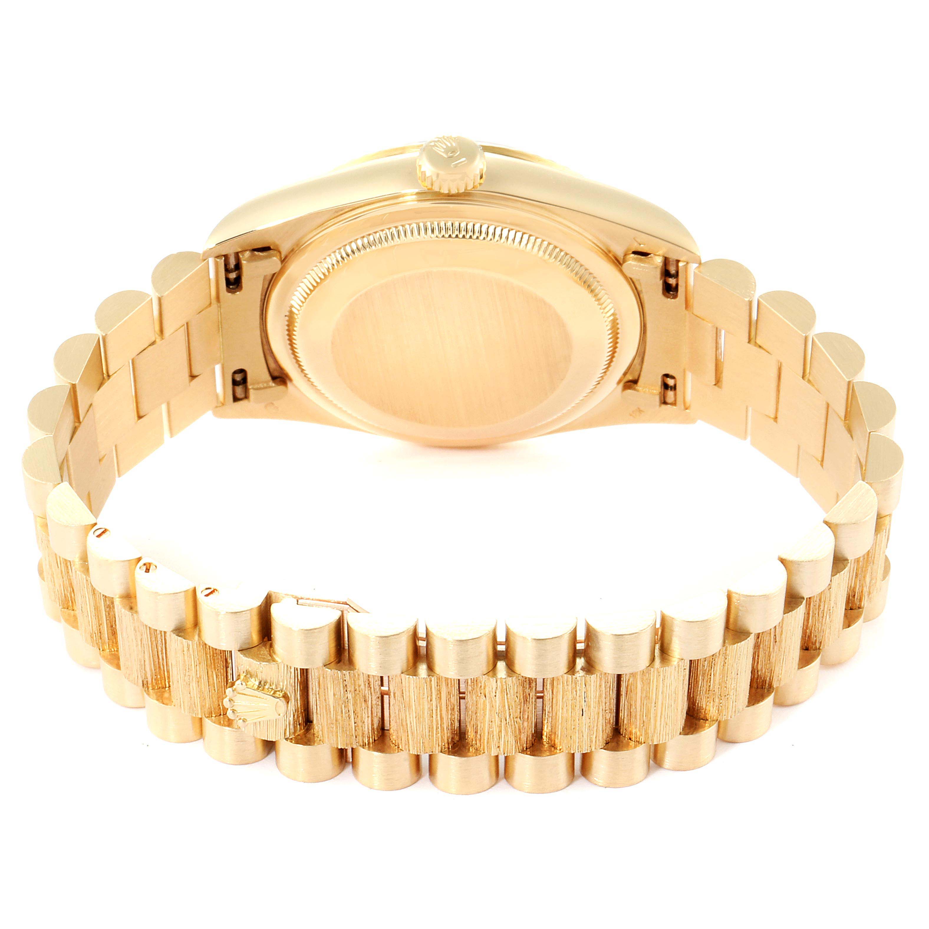 The image shows the back view of a Rolex President 18238 Men's Yellow Gold Champagne Dial 18238 Men's Yellow Gold Champagne Dial model watch, highlighting the case back and bracelet.