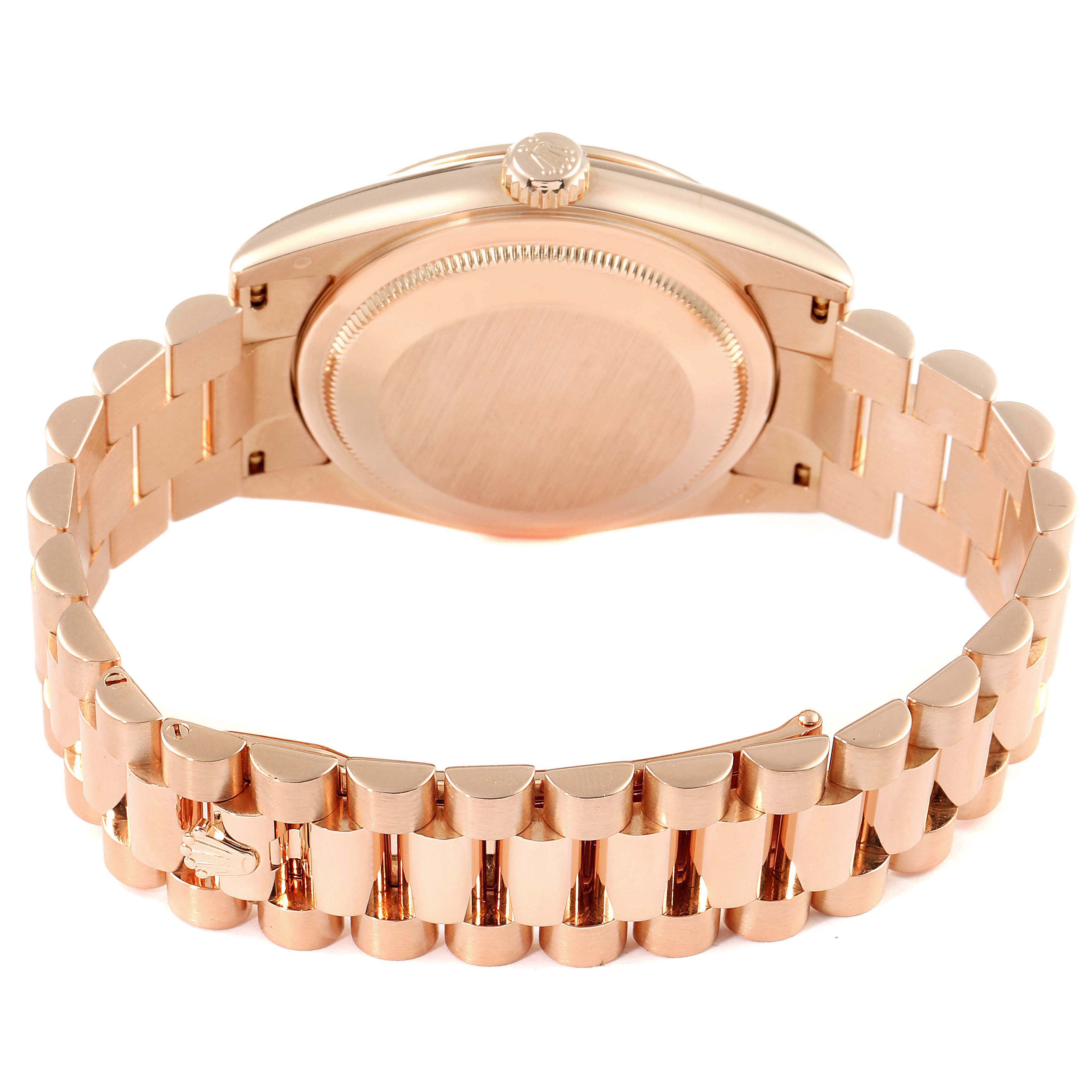 This image shows the back view of a Rolex President 118235 Men's Rose Gold Mother of Pearl Dial 118235 Men's Rose Gold Mother of Pearl Dial model watch, highlighting its bracelet and case back.