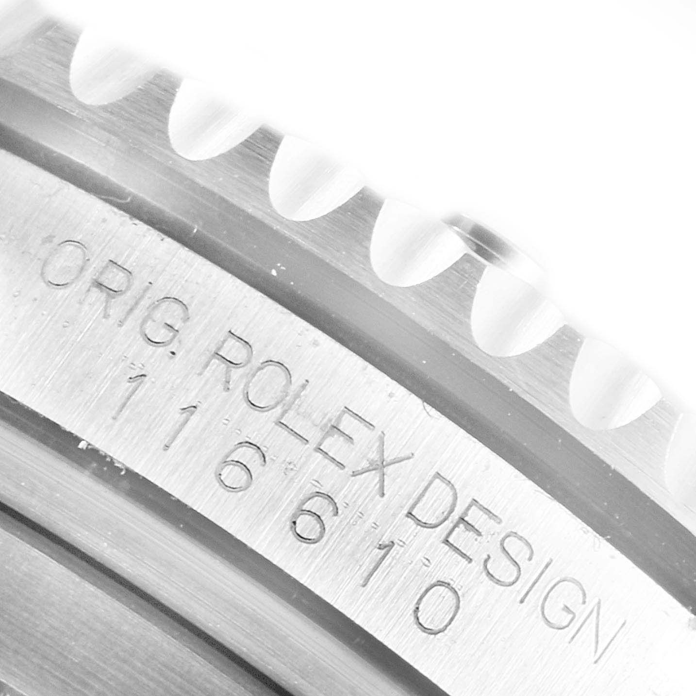 This image shows a close-up of the engraved side and toothed bezel of a Rolex Submariner 116610 Men
s Stainless Steel Black Dial 116610 Men
s Stainless Steel Black Dial watch.