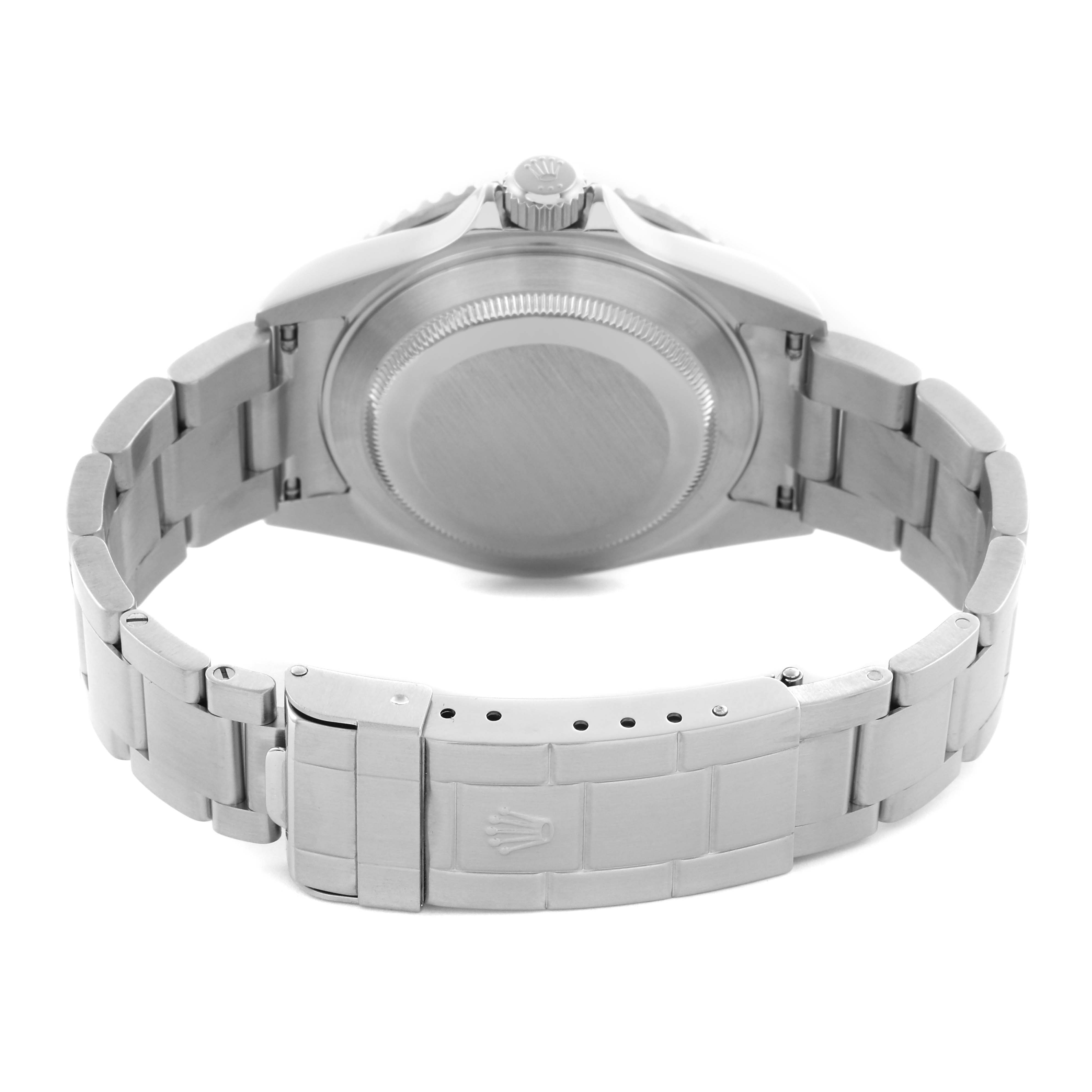 The image shows the back of a Rolex Submariner 16610 Men
s Stainless Steel Black Dial 16610 Men
s Stainless Steel Black Dial, highlighting the case back, bracelet, and clasp from a rear angle.