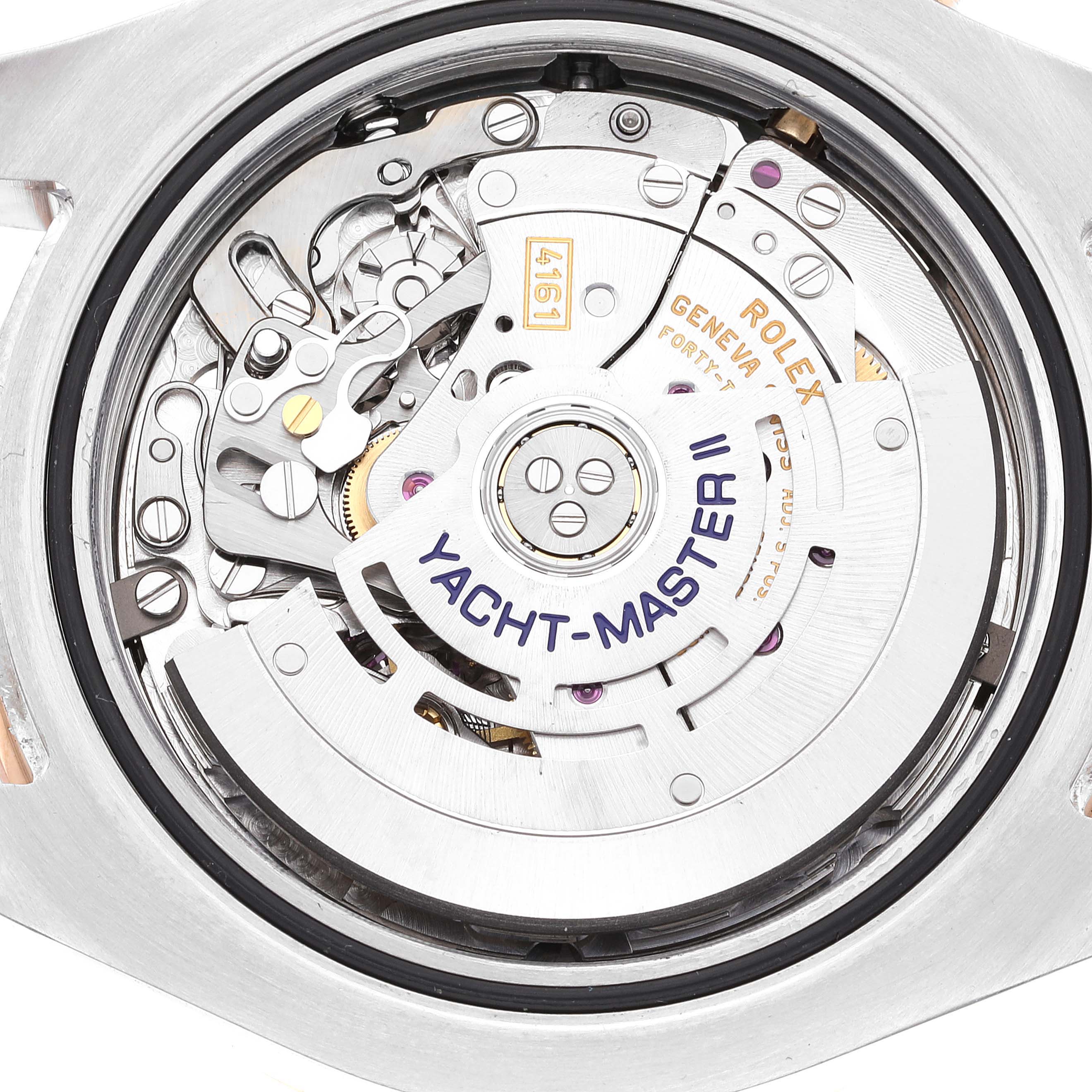 This image shows the intricate inner mechanism of a Rolex Yacht-Master 116681 Men's Steel and Gold (two tone) White Dial 116681 Men's Steel and Gold (two tone) White Dial model watch from a back angle.
