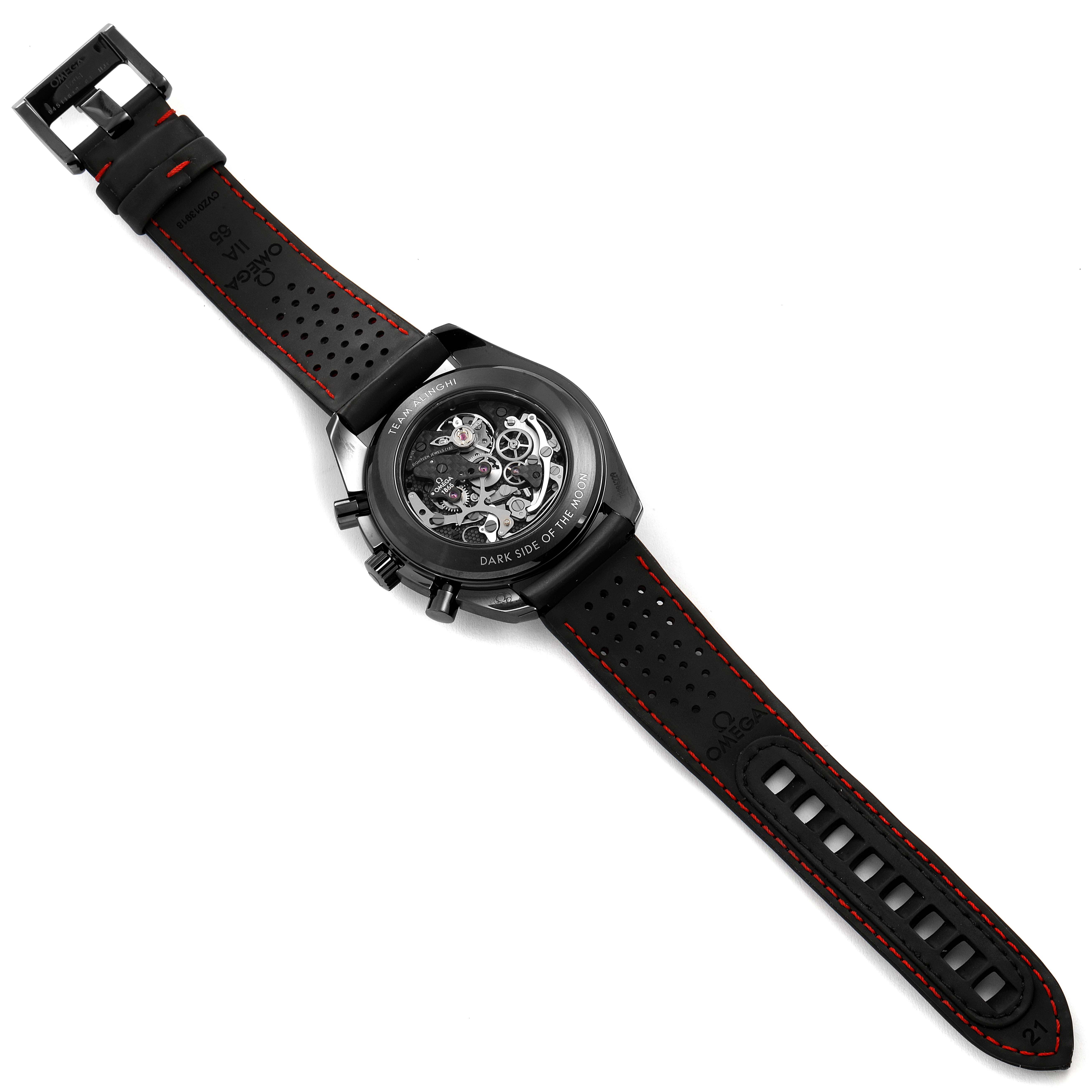 The image shows the Omega Speedmaster 311.92.44.30.01.002 Men's Ceramic Black Dial 311.92.44.30.01.002 Men's Ceramic Black Dial watch from a top-down angle, highlighting its black perforated strap and back case.