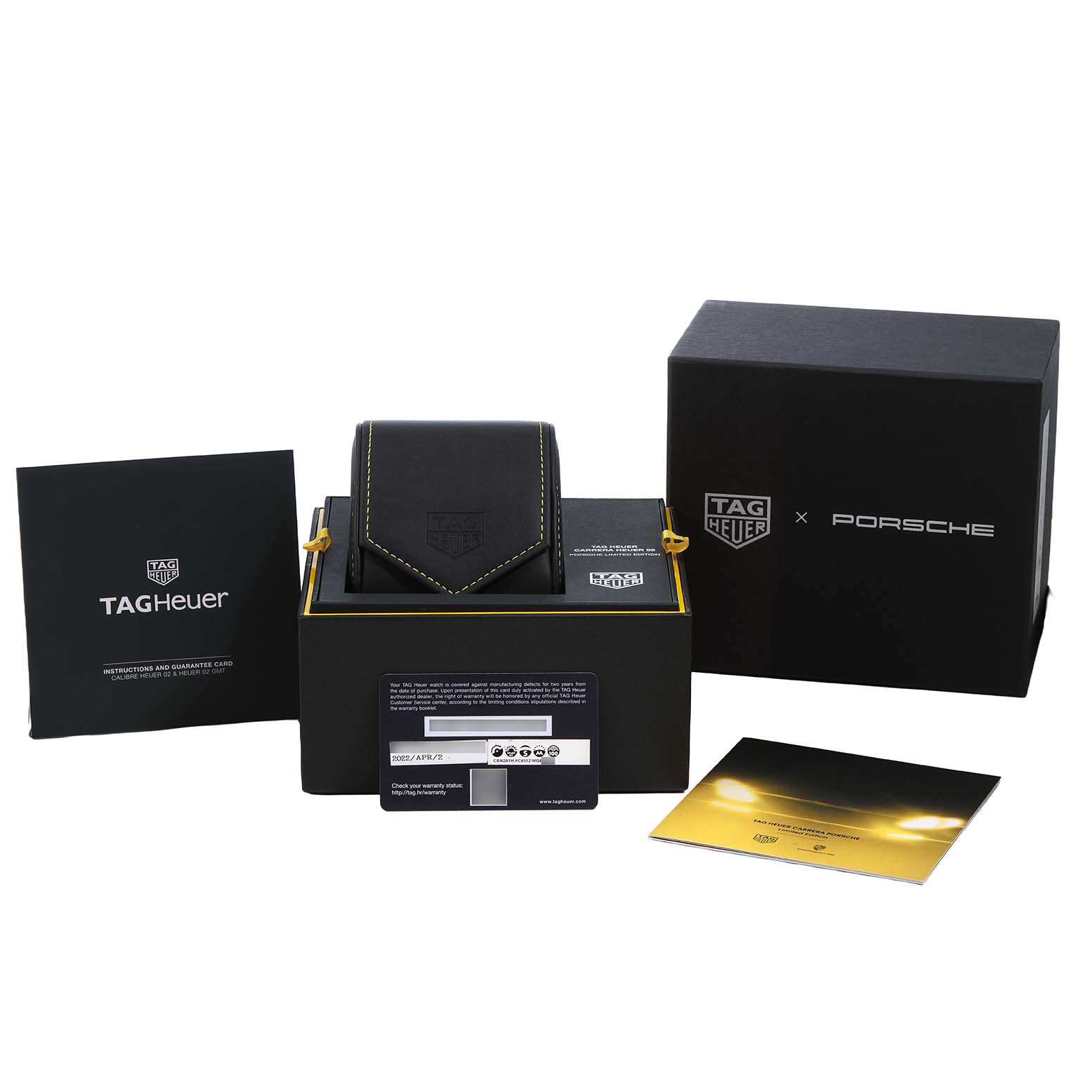 The image shows a Tag Heuer Carrera CBN2A1H Men's Stainless Steel Black Dial watch box set, including the case, warranty card, and packaging from a front angle.
