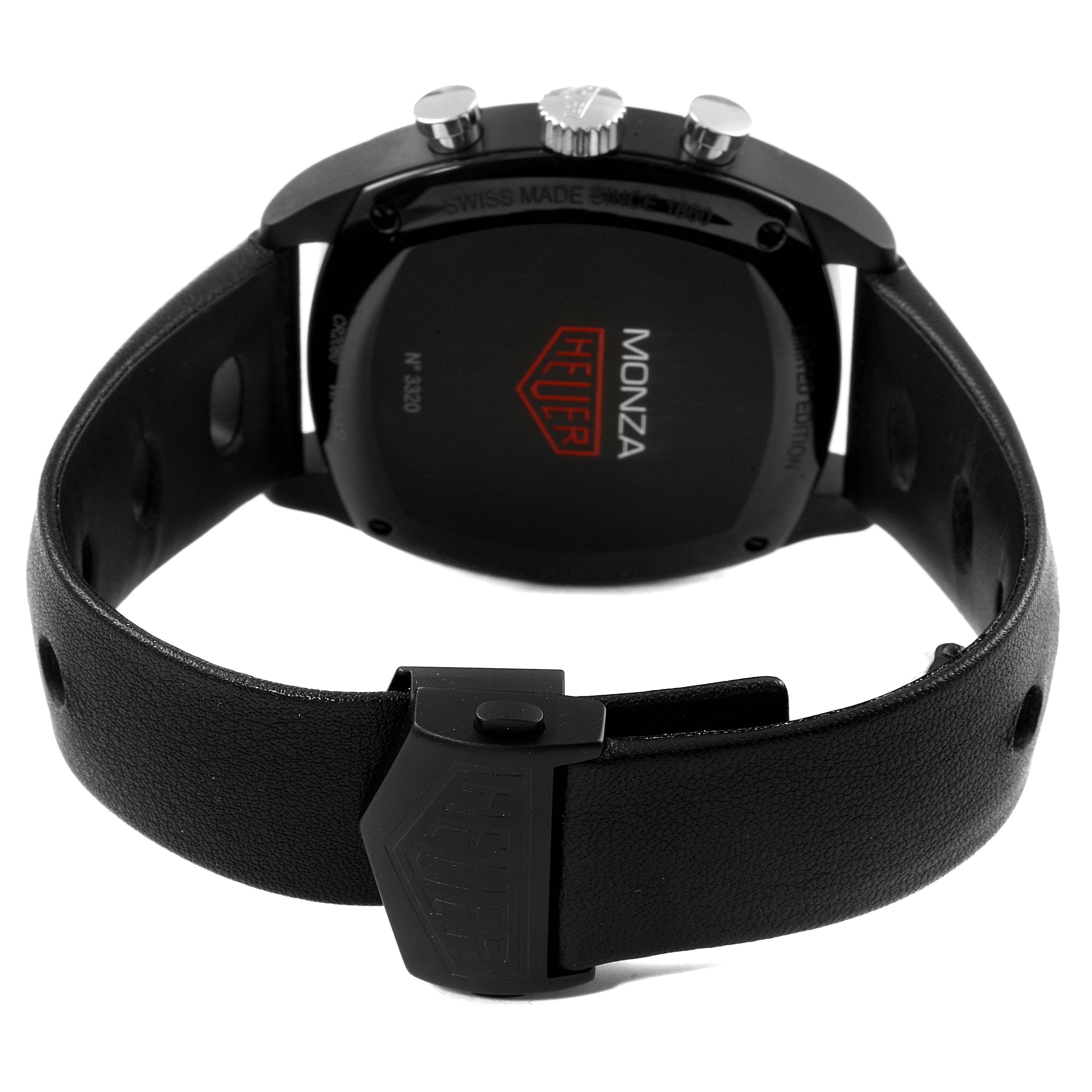 The image shows the back side of a Tag Heuer Monza watch, highlighting the case back, strap, and clasp.