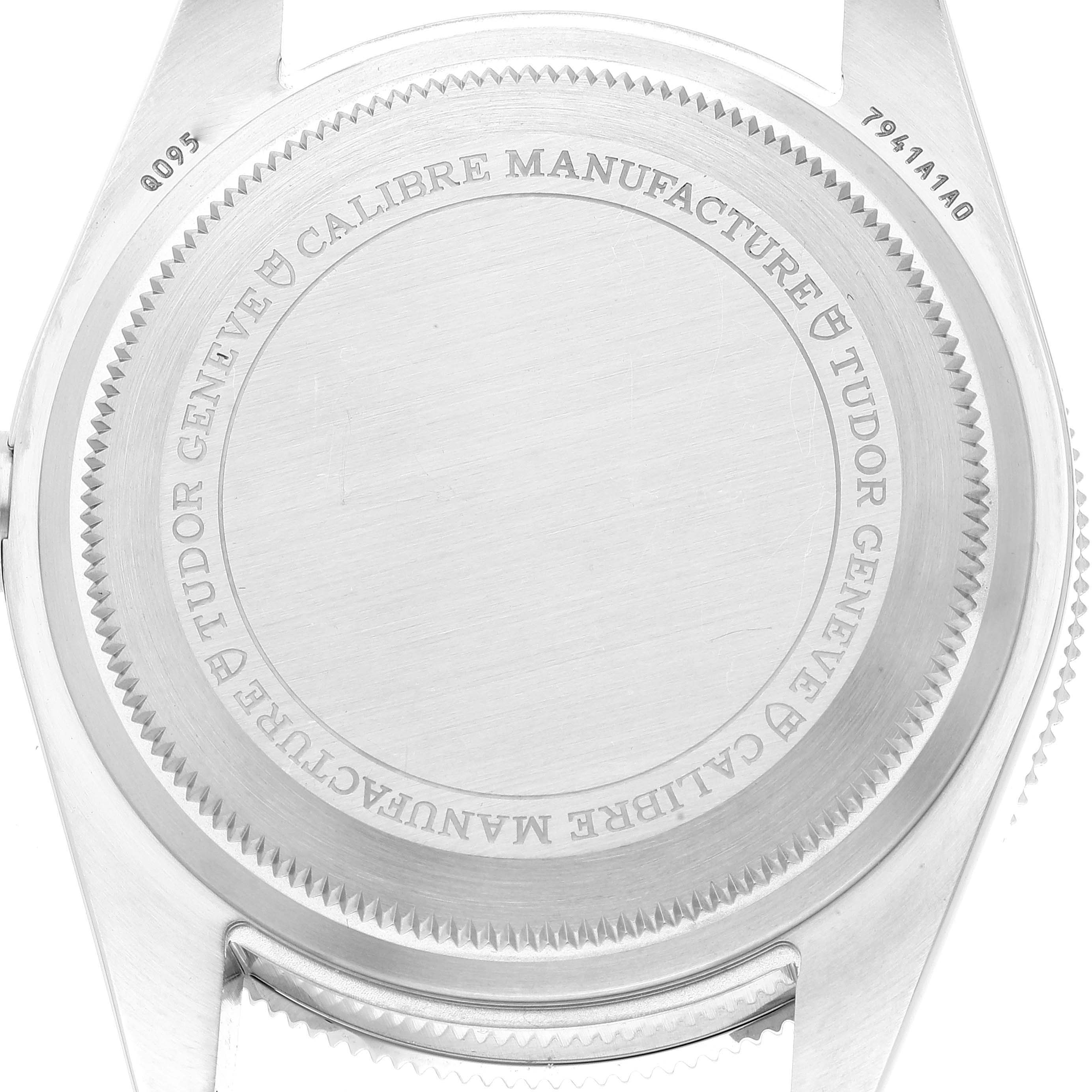 The image shows the back case of a Tudor Heritage Black Bay M7941A1A0RU-0001 Men
s Stainless Steel Black Dial M7941A1A0RU-0001 Men
s Stainless Steel Black Dial watch, displaying engravings and case details.