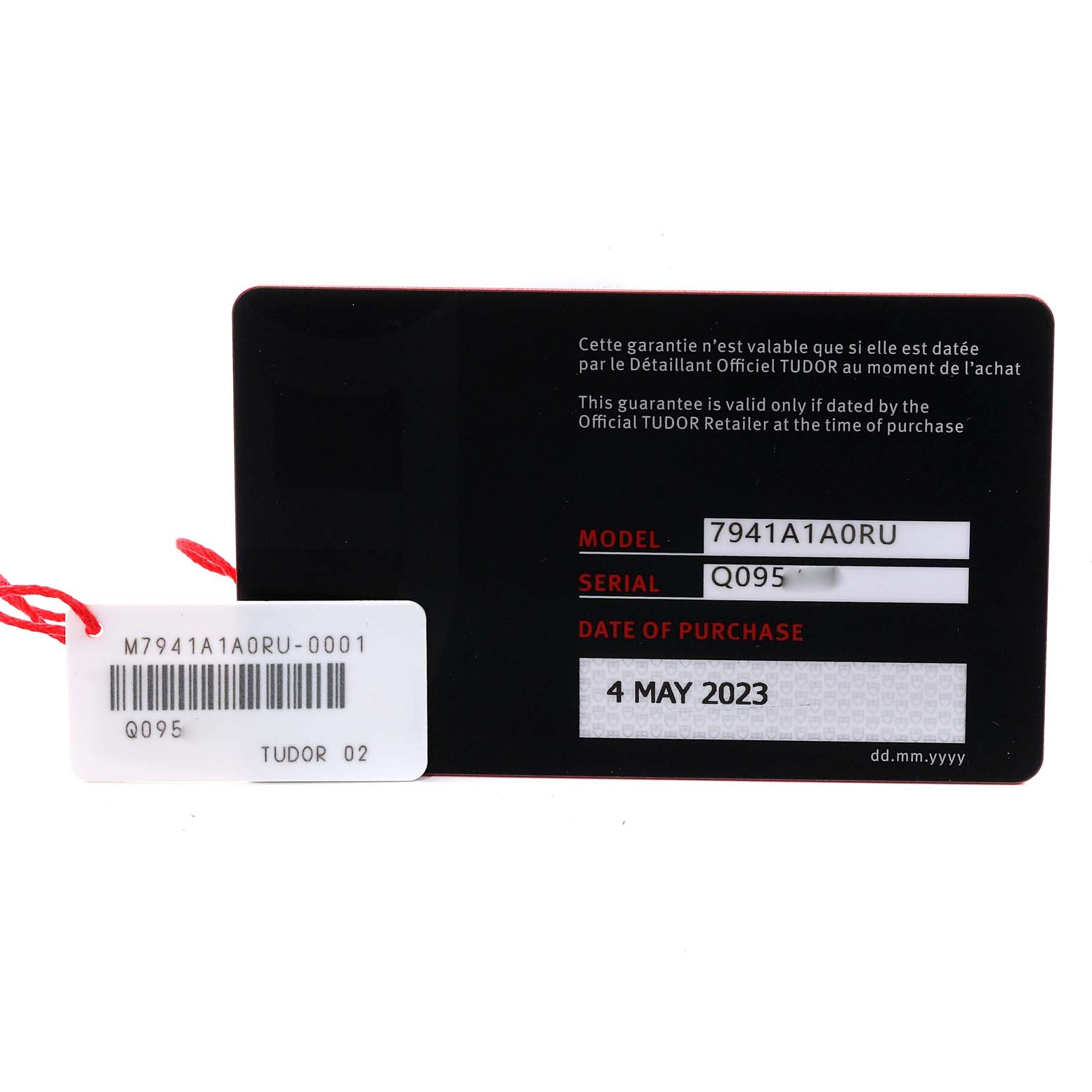 The image shows the warranty card and tag for a Tudor Heritage Black Bay M7941A1A0RU-0001 Men
s Stainless Steel Black Dial M7941A1A0RU-0001 Men
s Stainless Steel Black Dial model watch, highlighting the model, serial number, and purchase date.