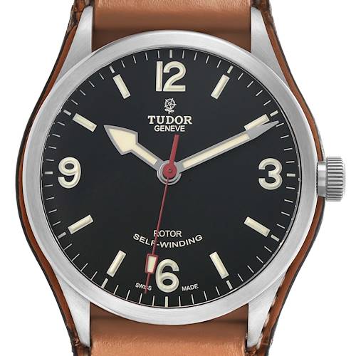 The Tudor Heritage Ranger M79910-0002 Men's Stainless Steel Black Dial watch is shown from a front angle, displaying the dial, hour markers, hands, and crown.