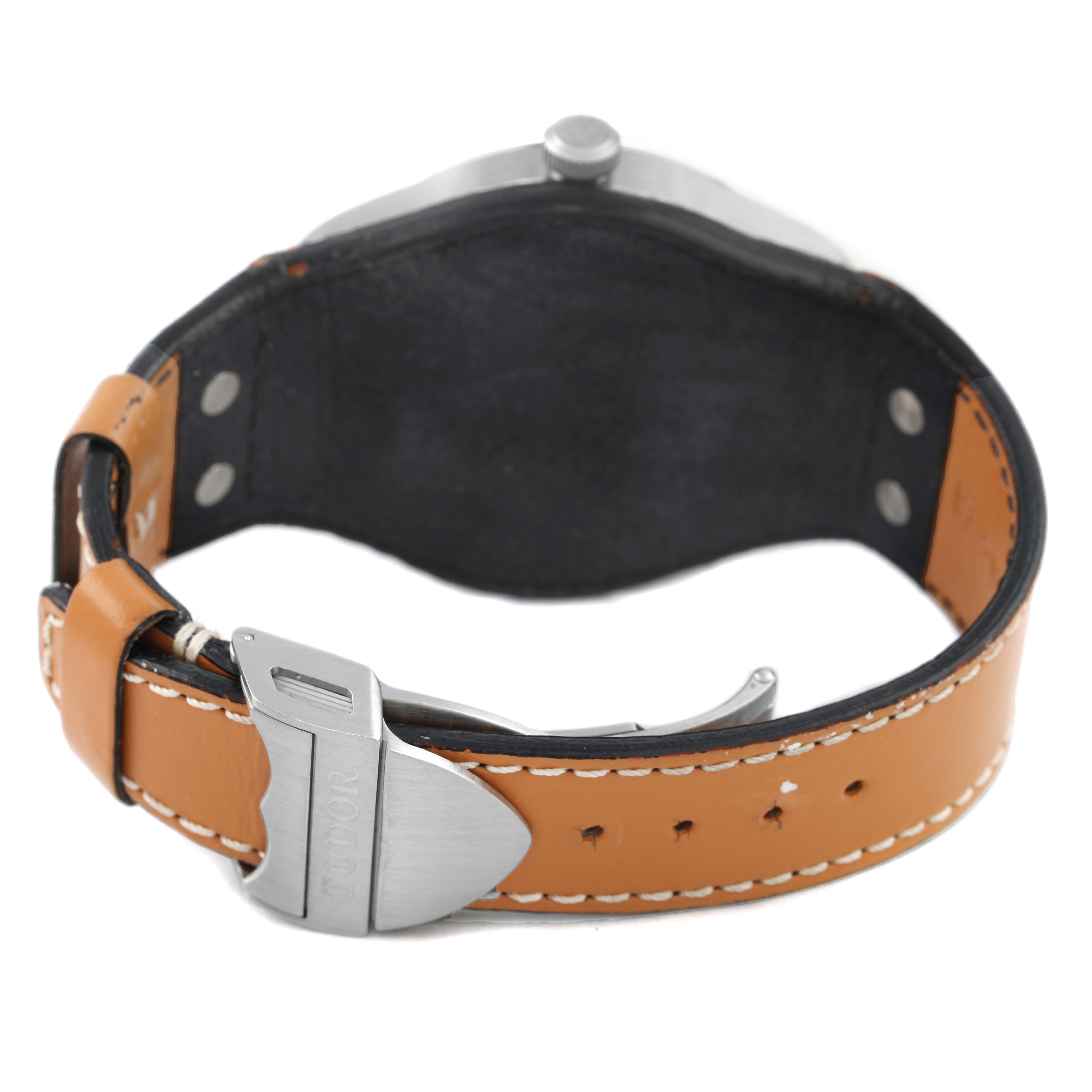 The image shows the Tudor Heritage Ranger M79910-0002 Men's Stainless Steel Black Dial from the back, highlighting the leather strap and clasp.