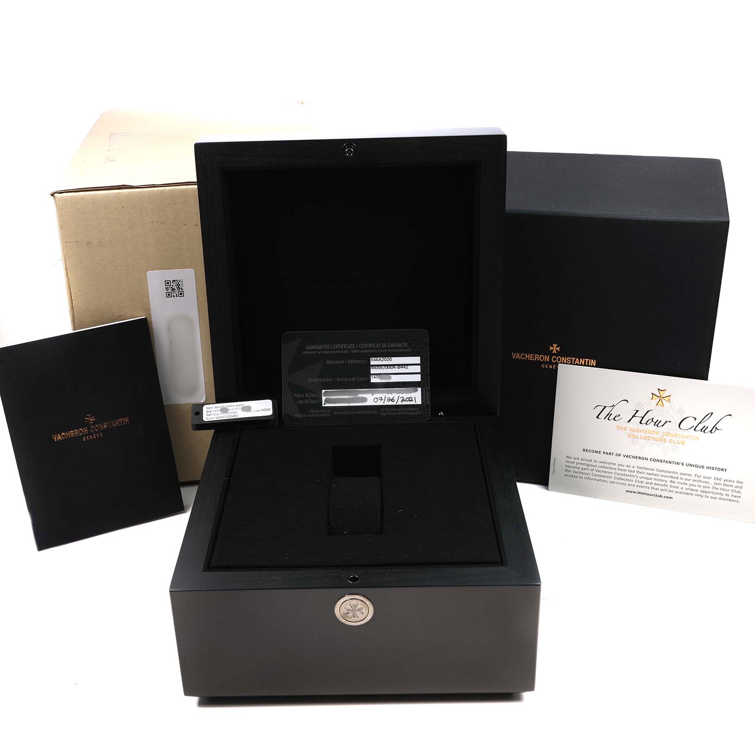 The image shows the Vacheron Constantin Fiftysix 4600E Men's Stainless Steel Silver Dial watch's box, warranty card, and accompanying documents from a frontal angle.