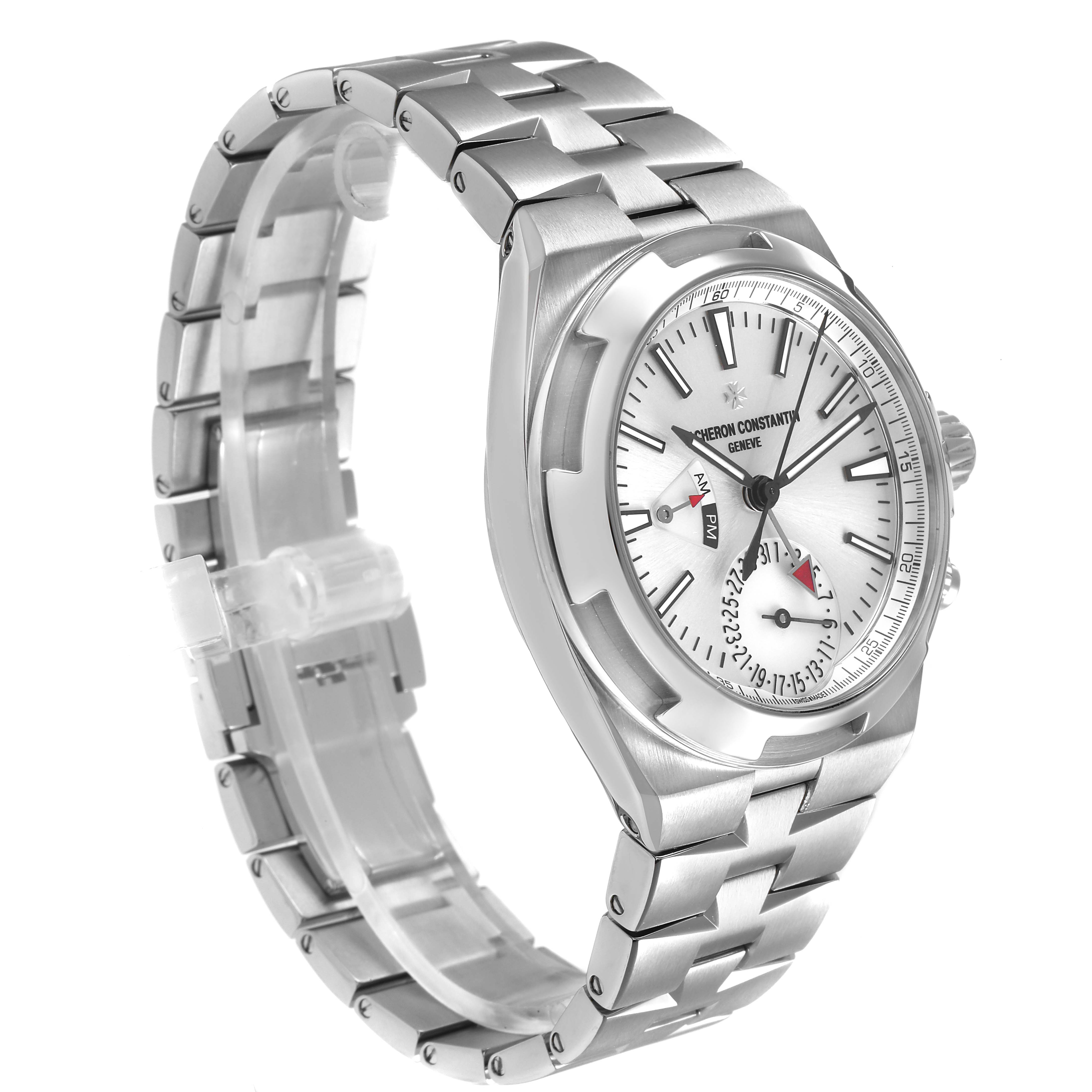 The Vacheron Constantin Overseas 7900V Men's Stainless Steel Silver Dial watch is shown at a three-quarter angle, displaying its silver bracelet, case, and dial.