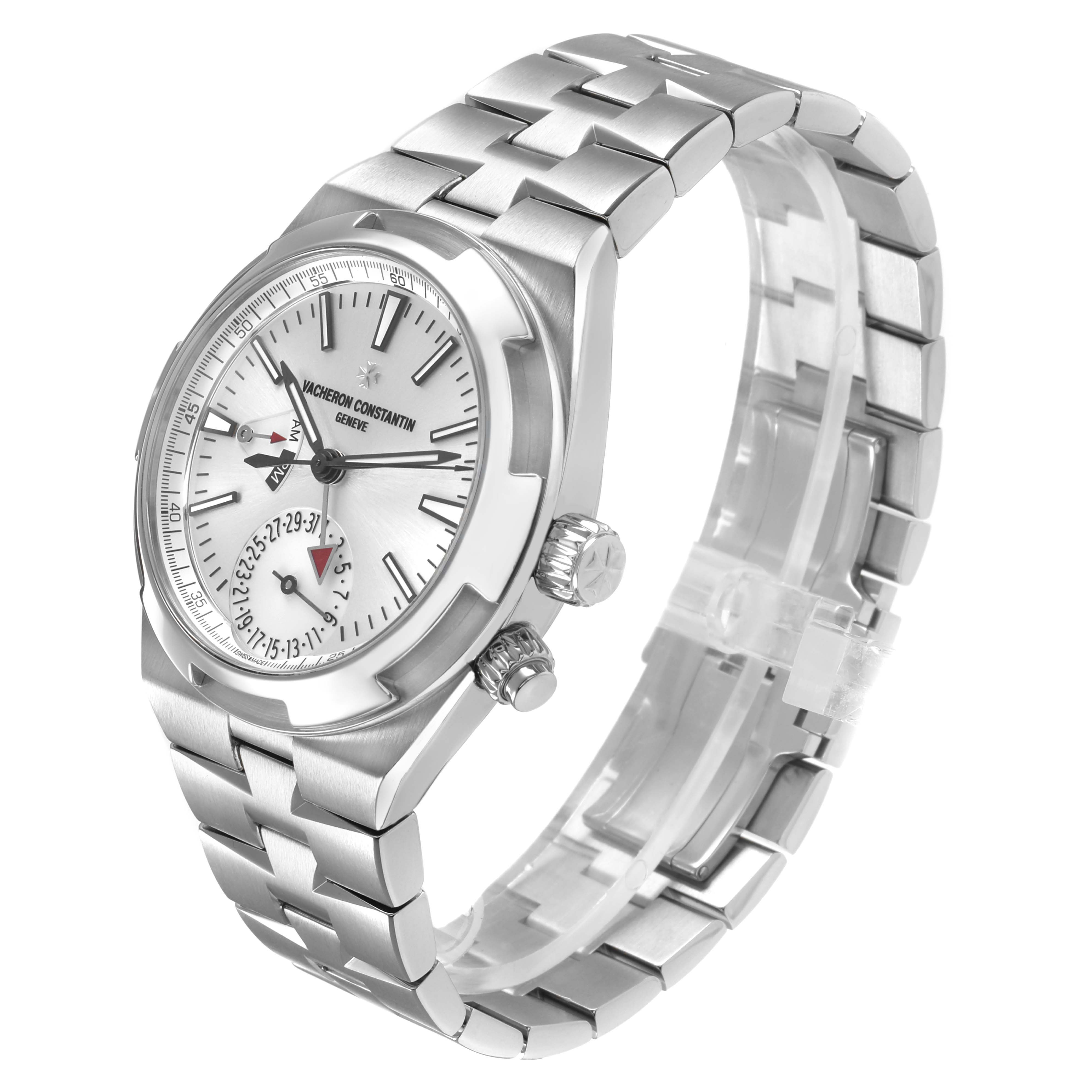 The Vacheron Constantin Overseas 7900V Men's Stainless Steel Silver Dial watch is shown at a three-quarter angle, highlighting the dial, crown, and stainless steel bracelet.