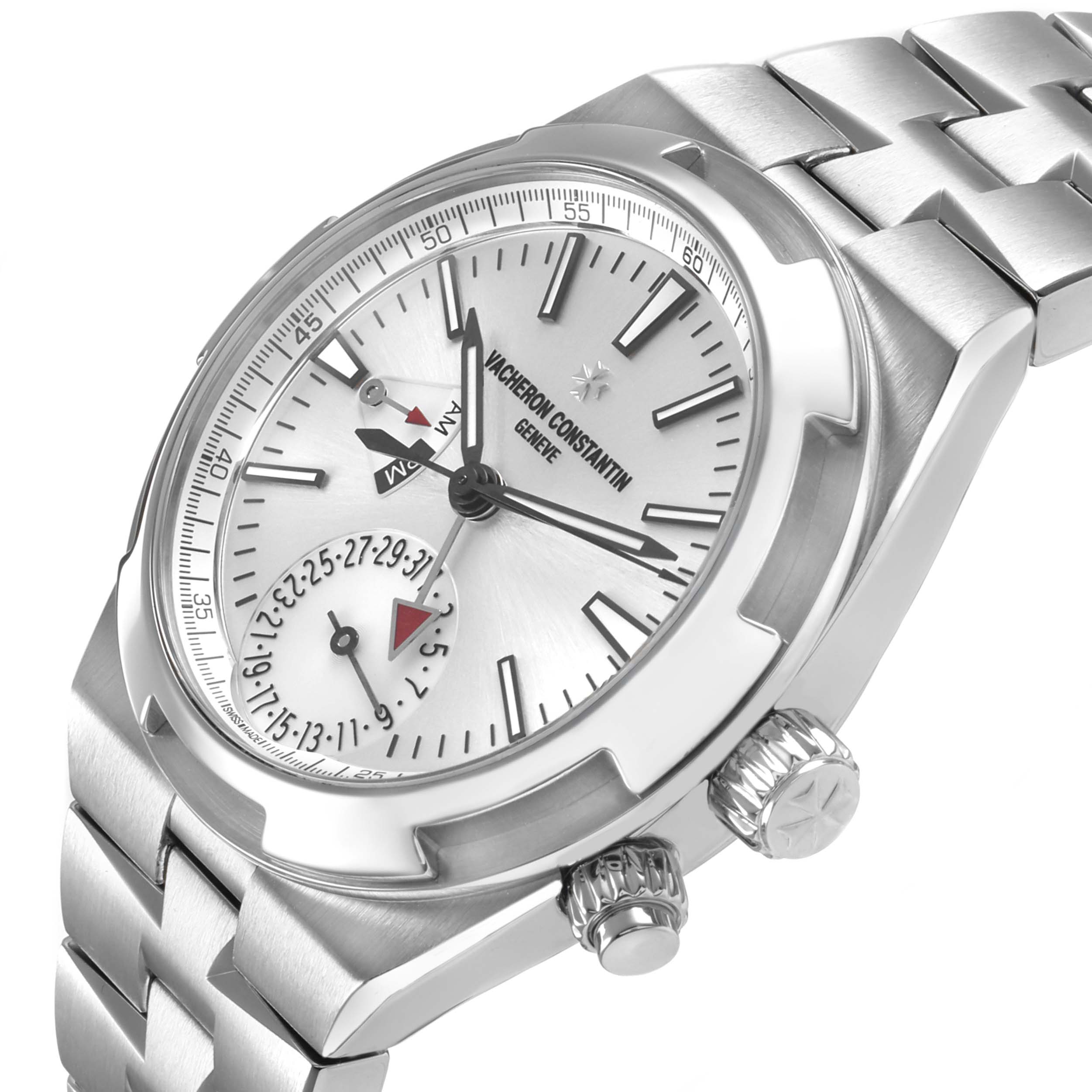 The Vacheron Constantin Overseas 7900V Men's Stainless Steel Silver Dial watch is shown at a three-quarter angle, highlighting the dial, crown, and bracelet.