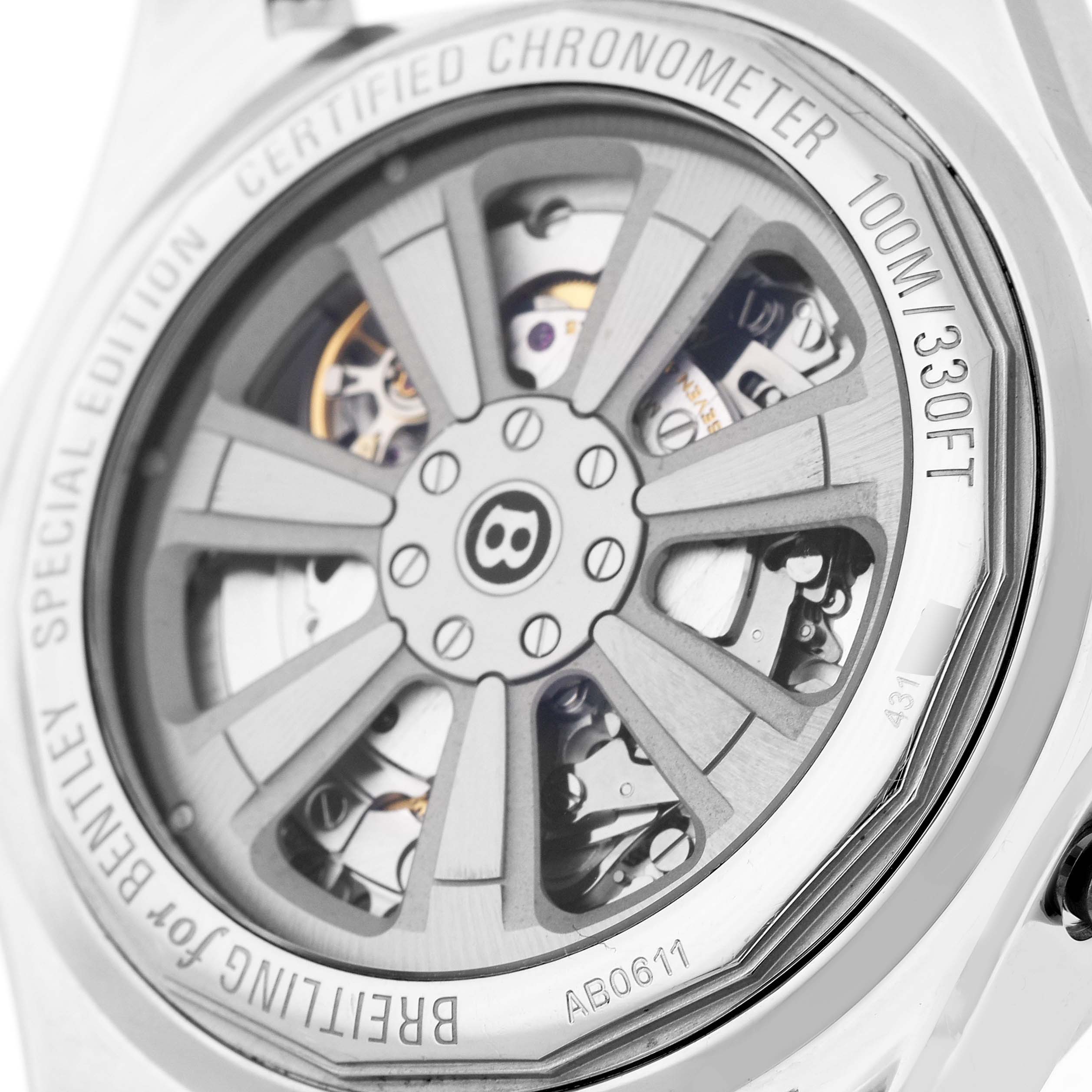 The Bentley model by Breitling is shown from the back, displaying the open case-back with visible mechanical components.