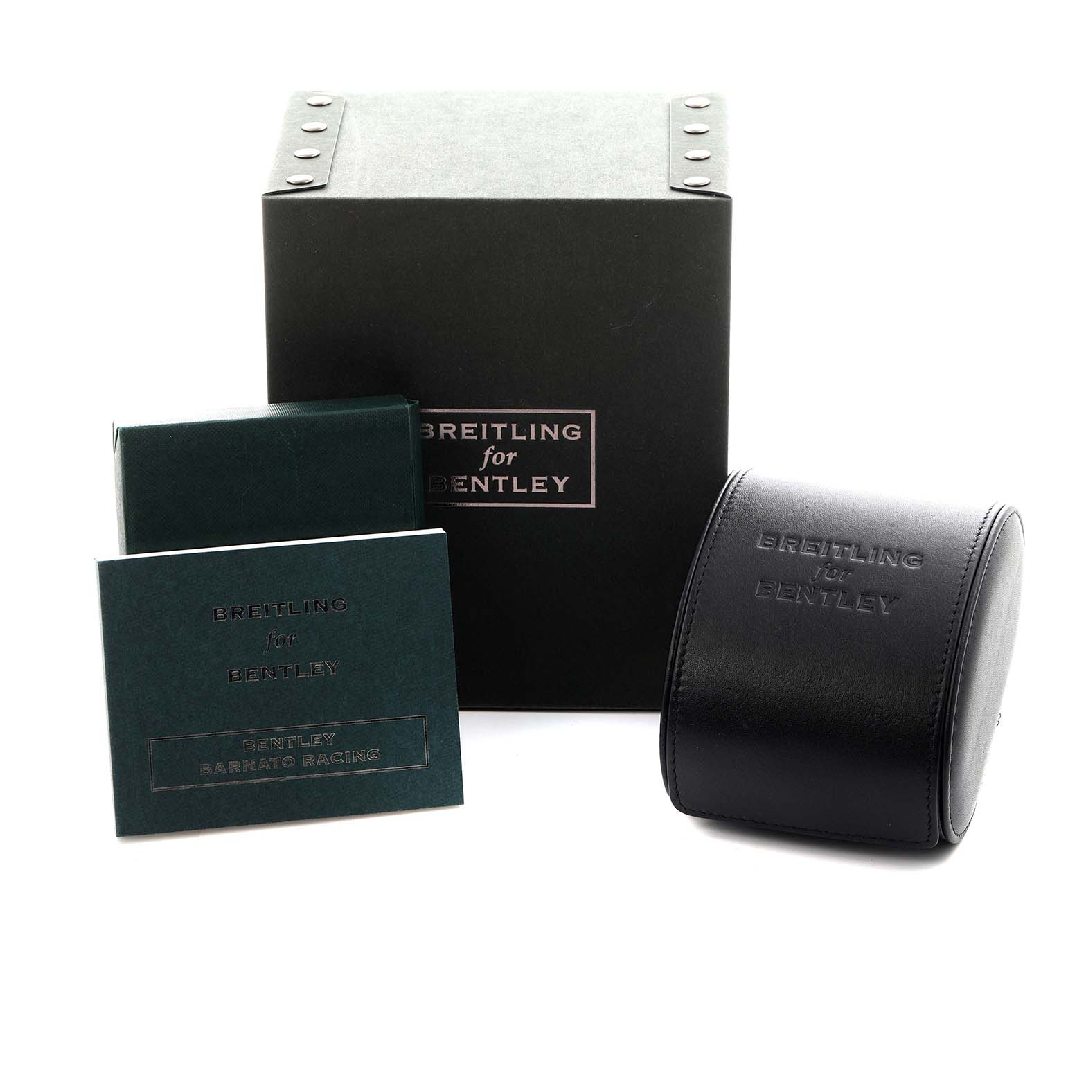 The image shows Breitling for Bentley packaging and accessories, including a leather watch case and boxes from a front angle.