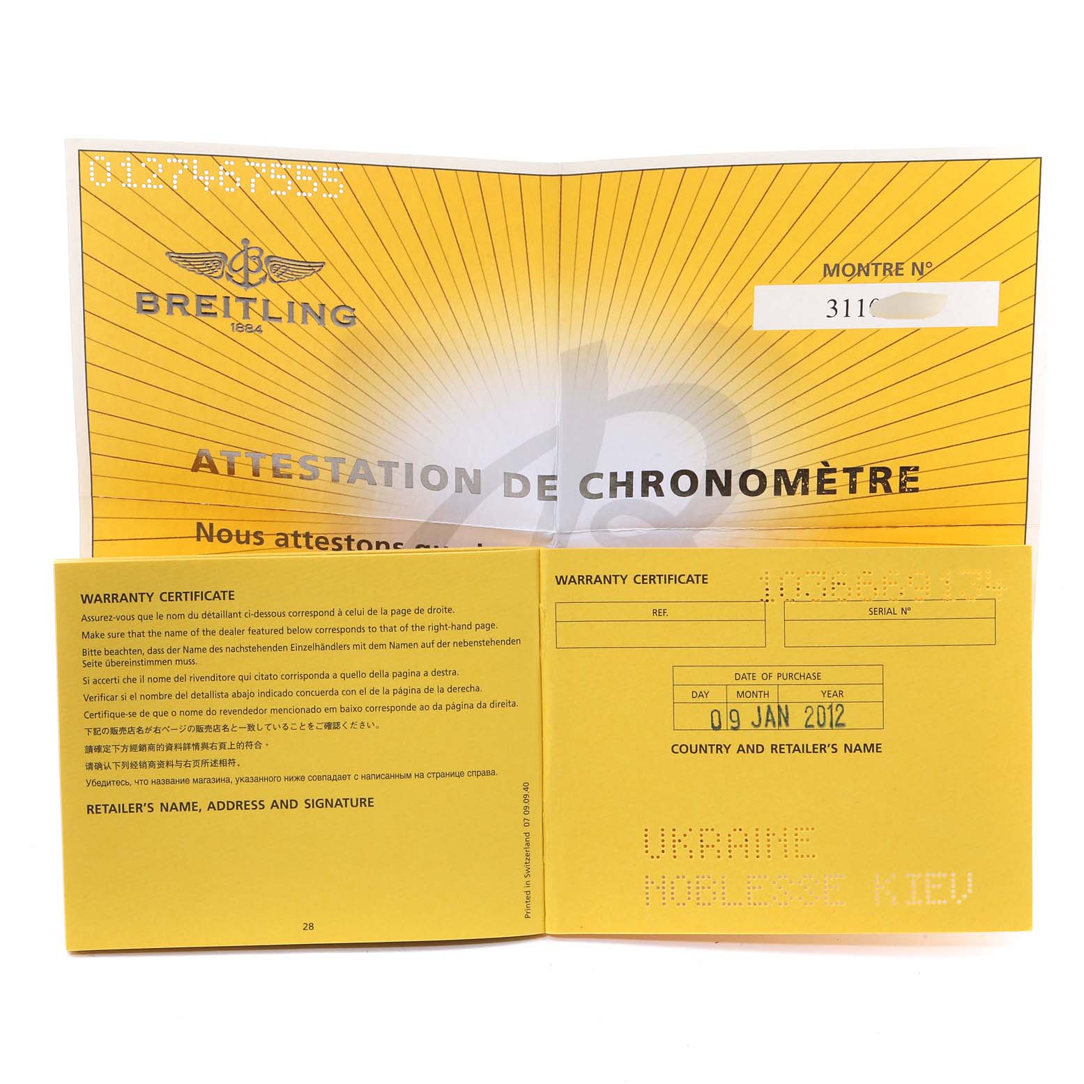 The image shows the warranty certificate and chronometer attestation for the Breitling Chronomat AB0110 Men
s Stainless Steel Black Dial AB0110 Men
s Stainless Steel Black Dial watch model.