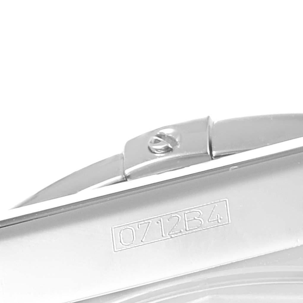 This close-up image shows a part of the clasp mechanism of a Breitling Chronomat AB0110 Men
s Stainless Steel Black Dial AB0110 Men
s Stainless Steel Black Dial watch.