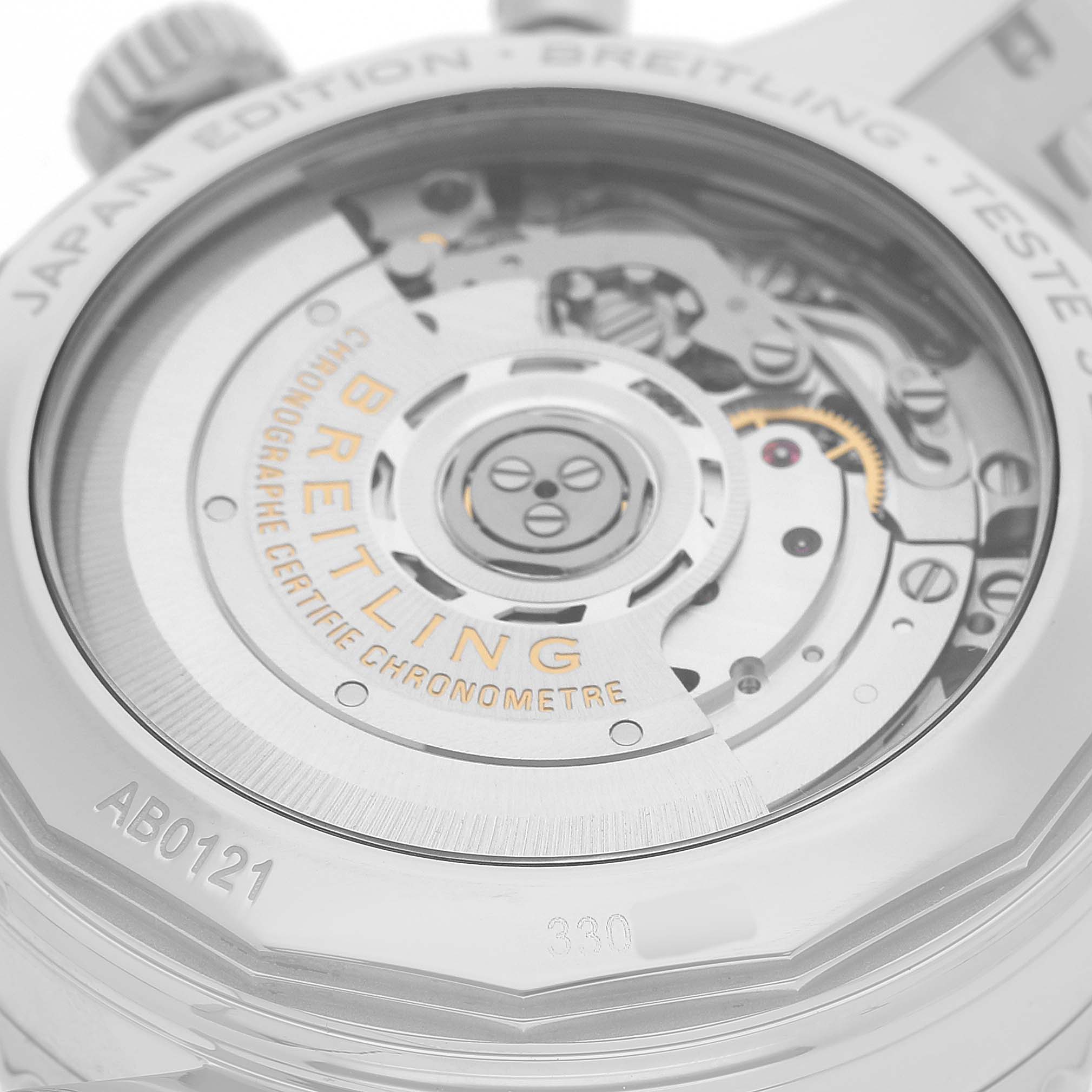 The image shows the caseback of a Breitling Navitimer AB0121 Men's Stainless Steel Black Dial watch, featuring its internal mechanical movement.