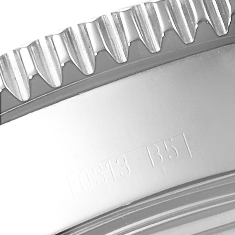 The image shows a close-up of the bezel and case of a Breitling Superocean A17364 Men
s Stainless Steel Black Dial A17364 Men
s Stainless Steel Black Dial watch.