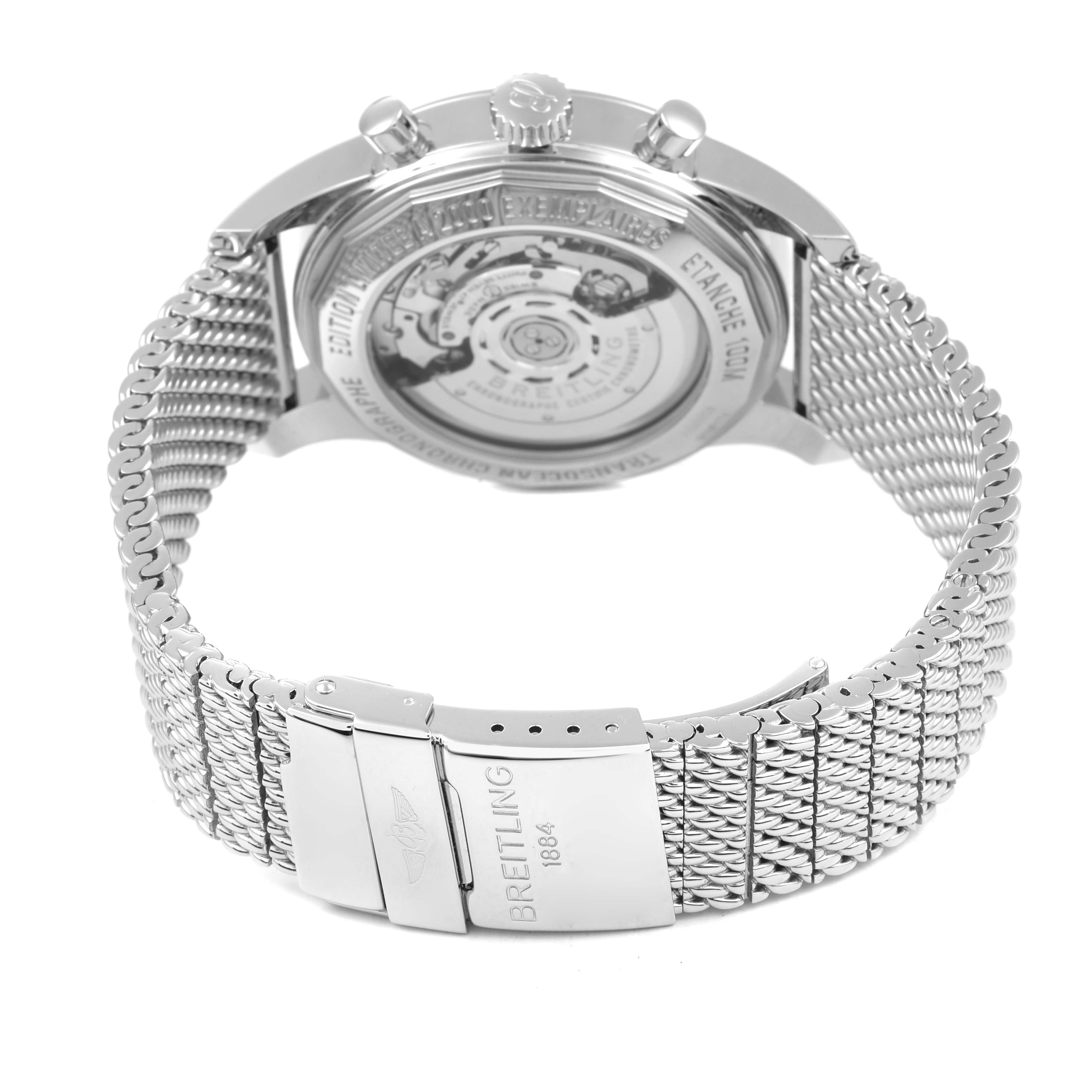 The image shows the back and clasp of a Breitling Transocean AB0151 Men's Stainless Steel Black Dial watch, highlighting its mesh bracelet and transparent case back.