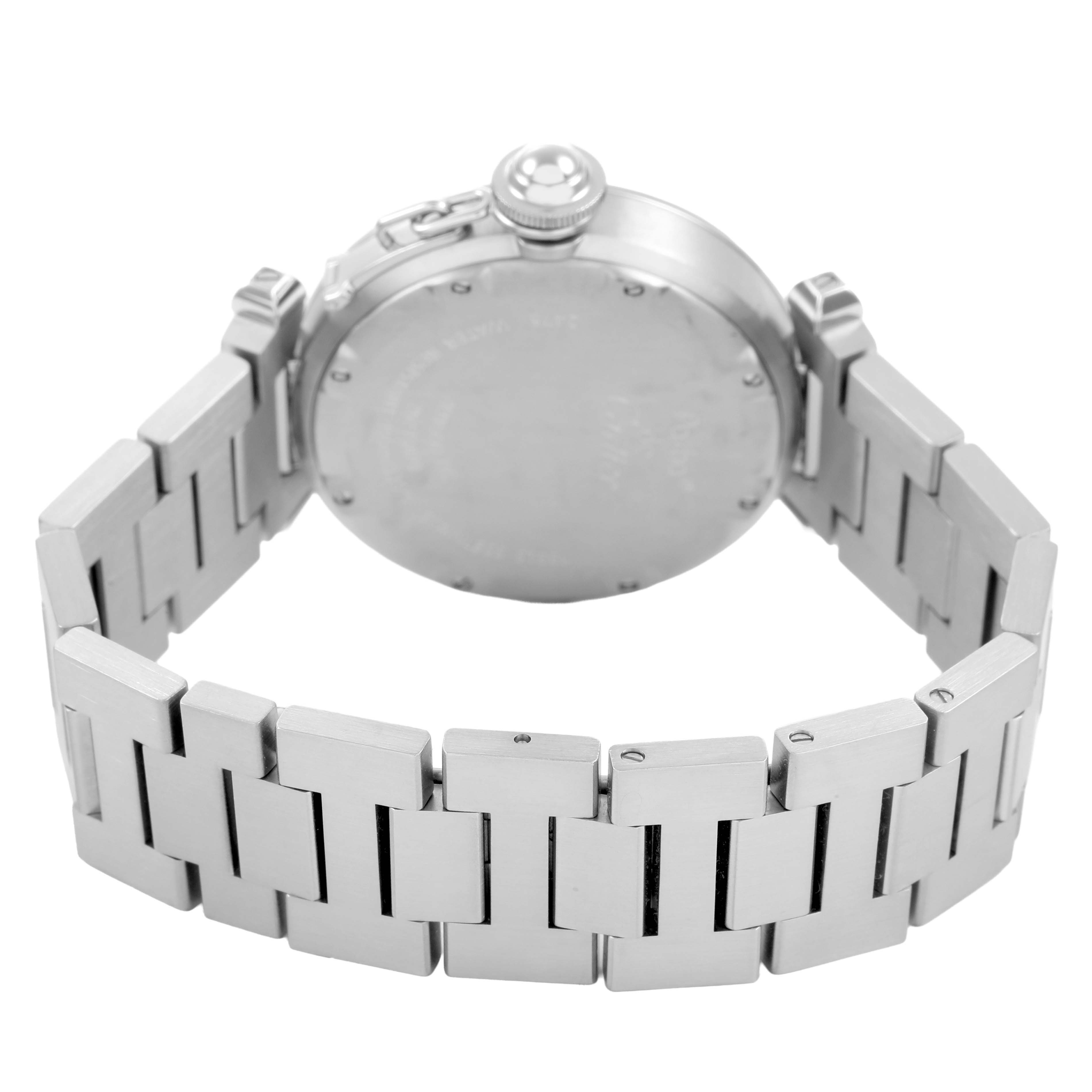 The image shows the back and side of a Cartier Pasha W31055M7 Men's Stainless Steel White Dial watch, highlighting its case, crown, and metal bracelet.