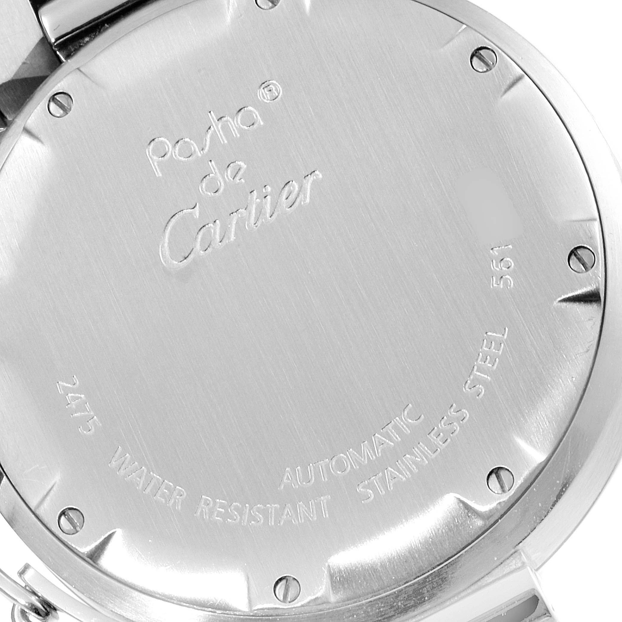 The image shows the back case of a Cartier Pasha W31044M7 Men's Stainless Steel White Dial W31044M7 Men's Stainless Steel White Dial watch, featuring engraved details and screws.