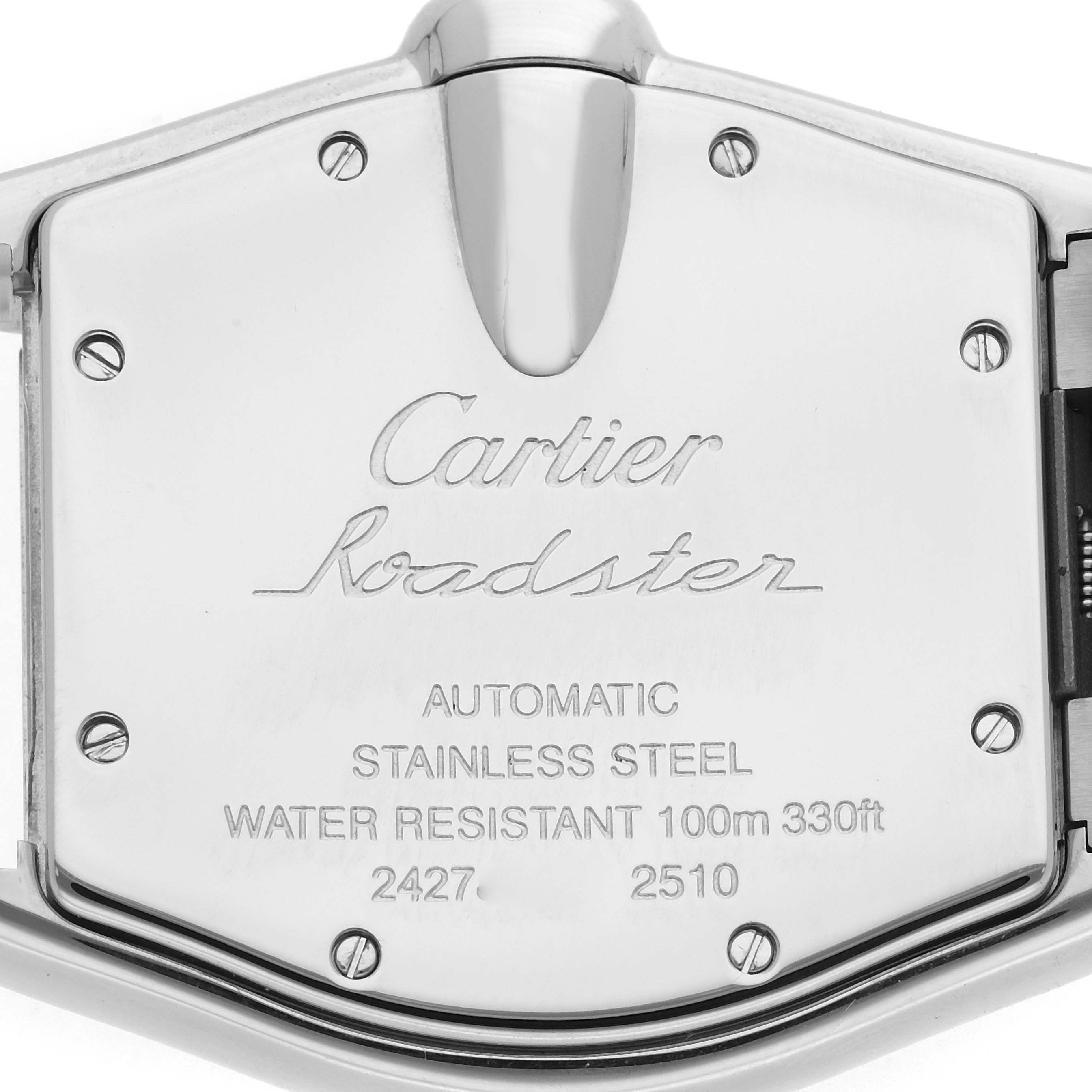 The image shows the back case of the Cartier Roadster W62041V3 Men
s Stainless Steel Black Dial W62041V3 Men
s Stainless Steel Black Dial watch, highlighting the engraved details and screws.