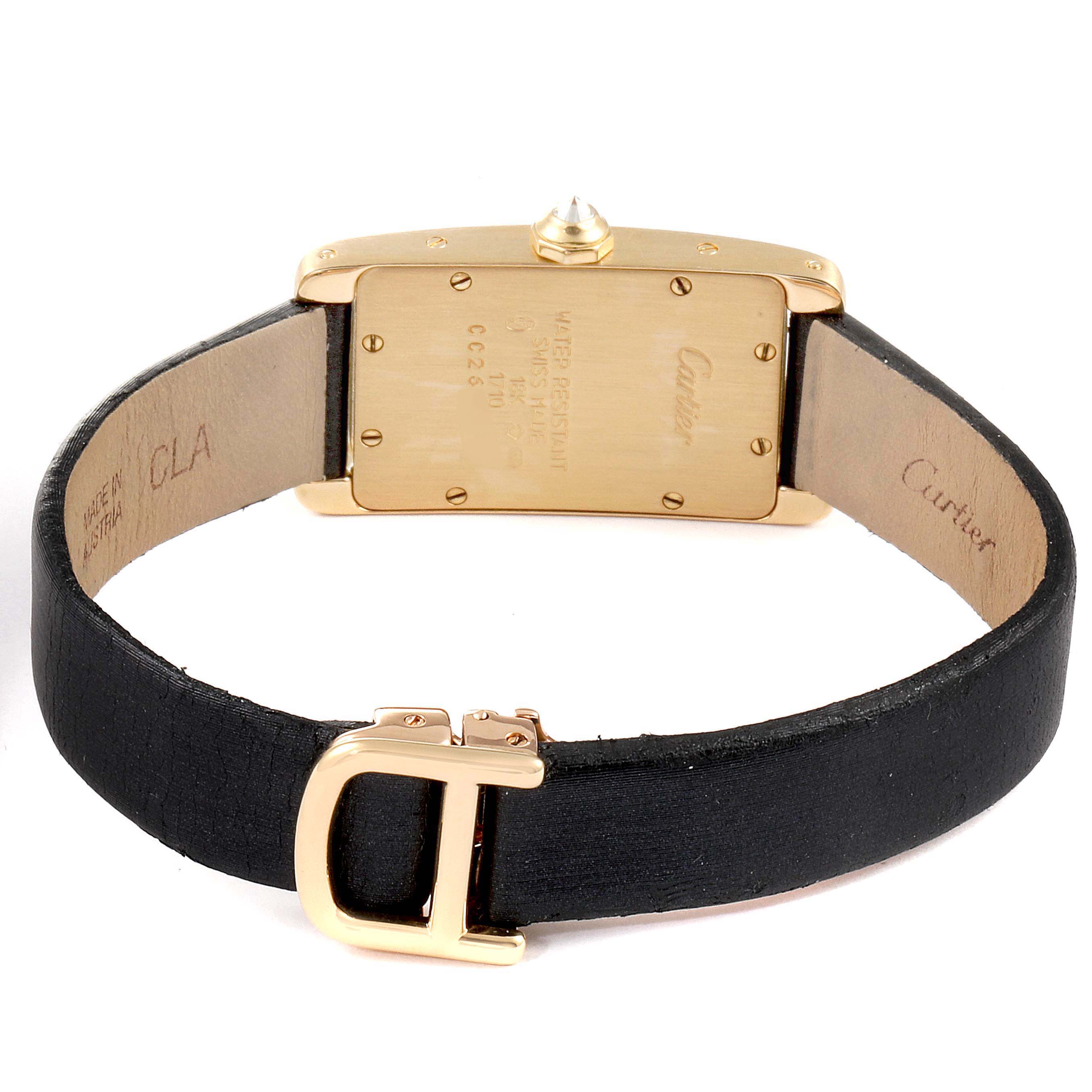 The image shows the back view of the Cartier Tank Americaine 1710 Women
s Yellow Gold Silver Dial 1710 Women
s Yellow Gold Silver Dial watch, highlighting the case back and leather strap with the buckle.