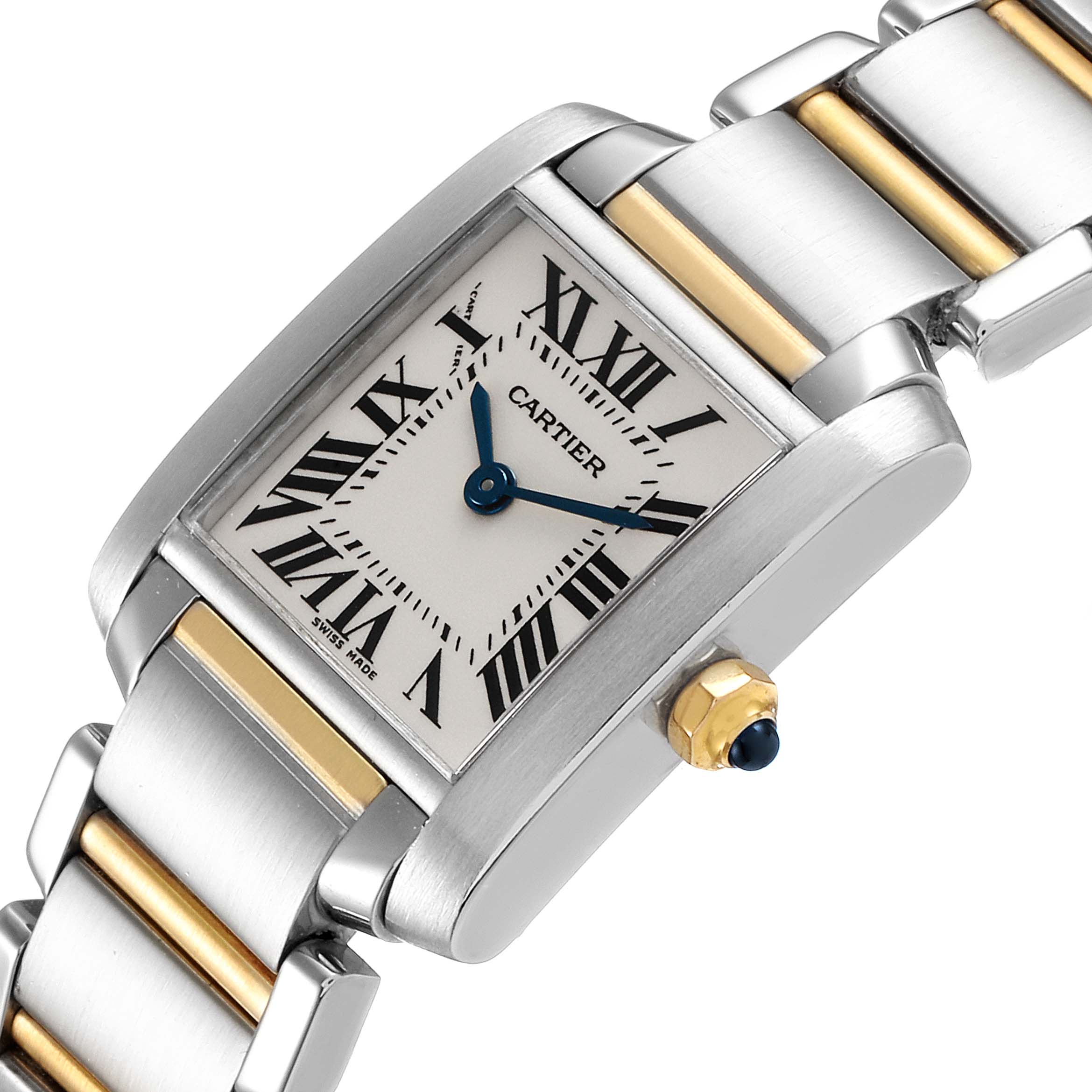 The image shows a Cartier Tank Francaise W51007Q4 Women's Steel and Gold (two tone) Silver Dial W51007Q4 Women's Steel and Gold (two tone) Silver Dial watch at an angle highlighting its face, Roman numerals, bracelet, and crown with a blue cabochon.