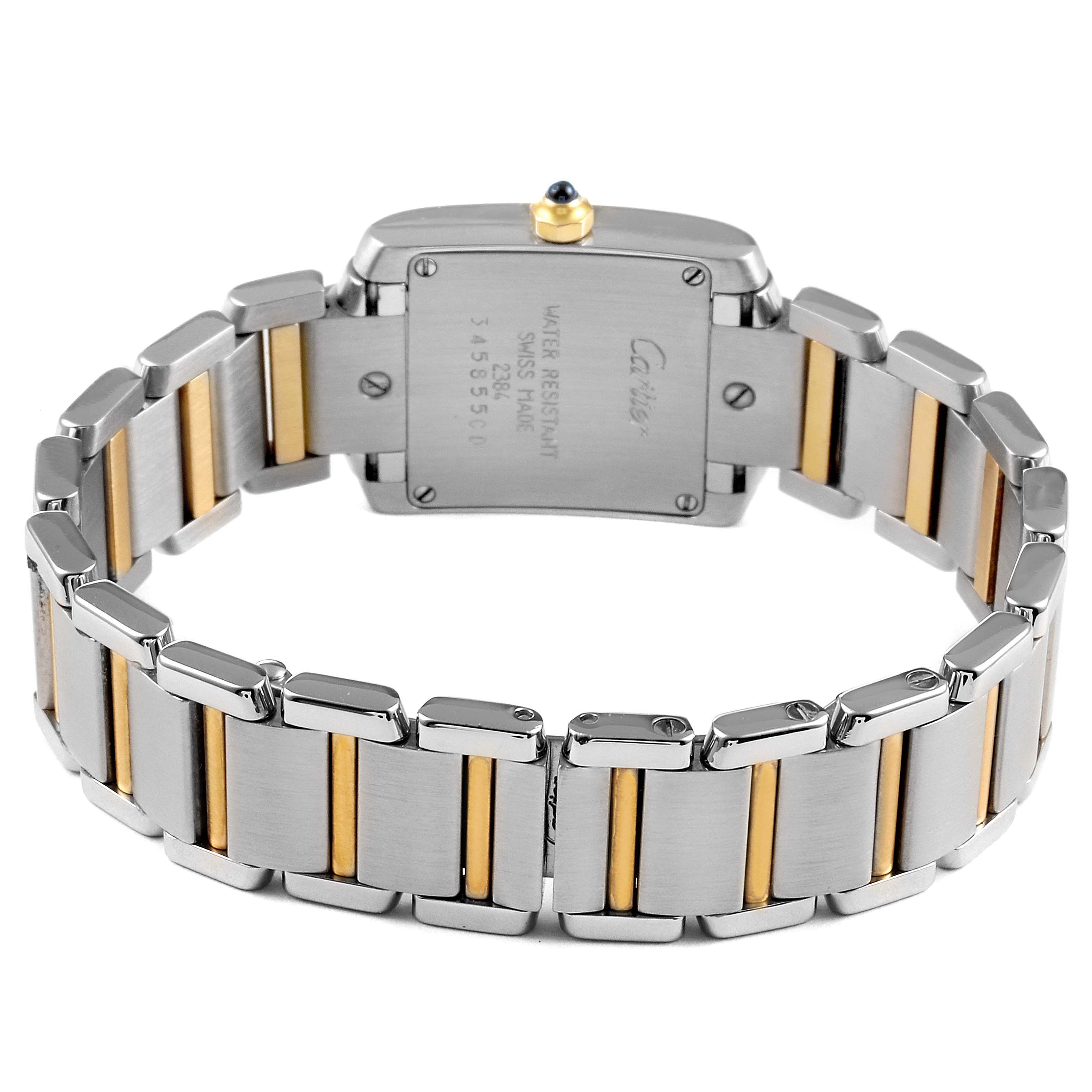 The image shows the back view of a Cartier Tank Francaise W51007Q4 Women's Steel and Gold (two tone) Silver Dial W51007Q4 Women's Steel and Gold (two tone) Silver Dial watch, displaying its two-tone metal bracelet and case back.