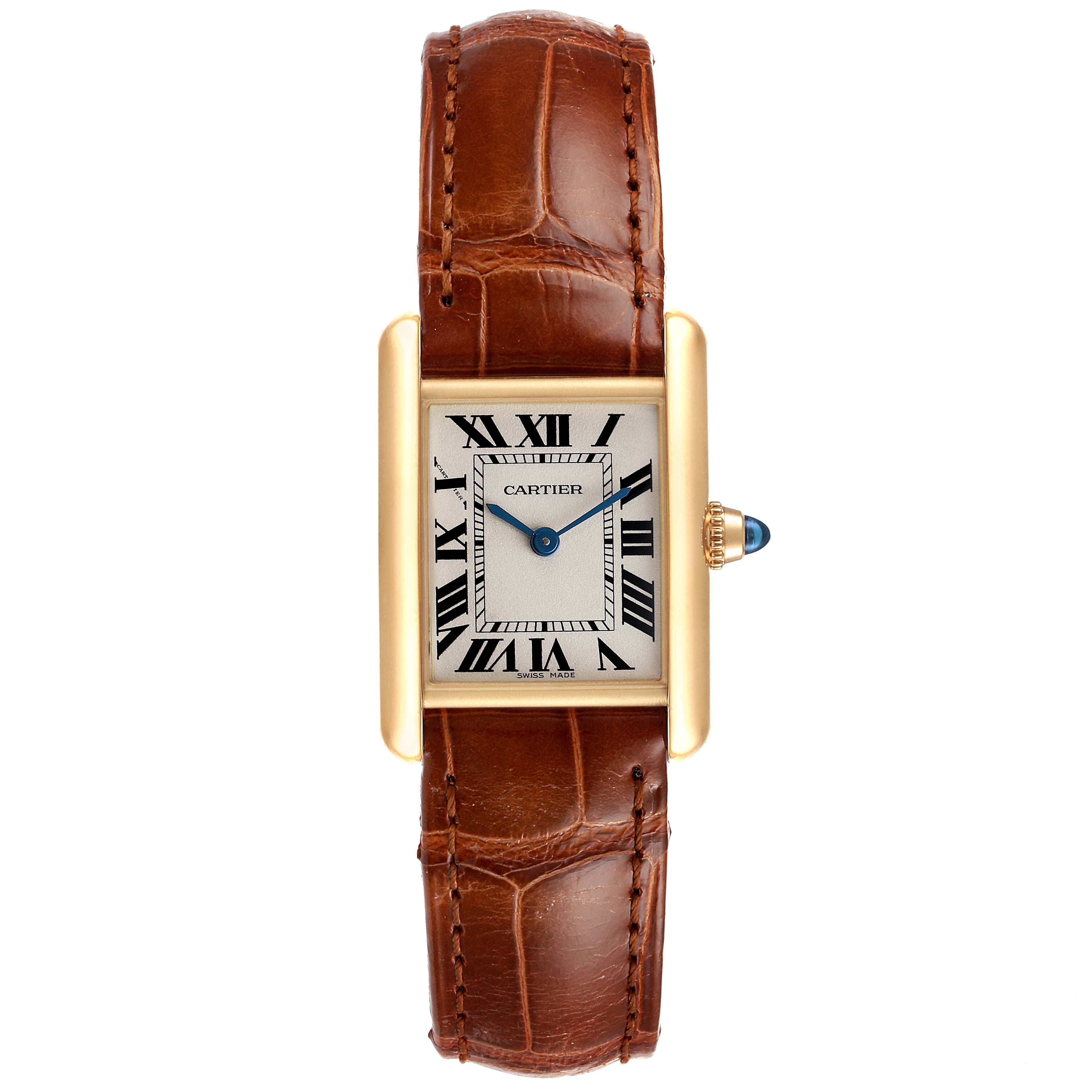 The image shows a front view of the Cartier Tank Louis W1529856 Women's Yellow Gold Silver Dial W1529856 Women's Yellow Gold Silver Dial watch, highlighting its face, brown leather strap, and rectangular gold case.
