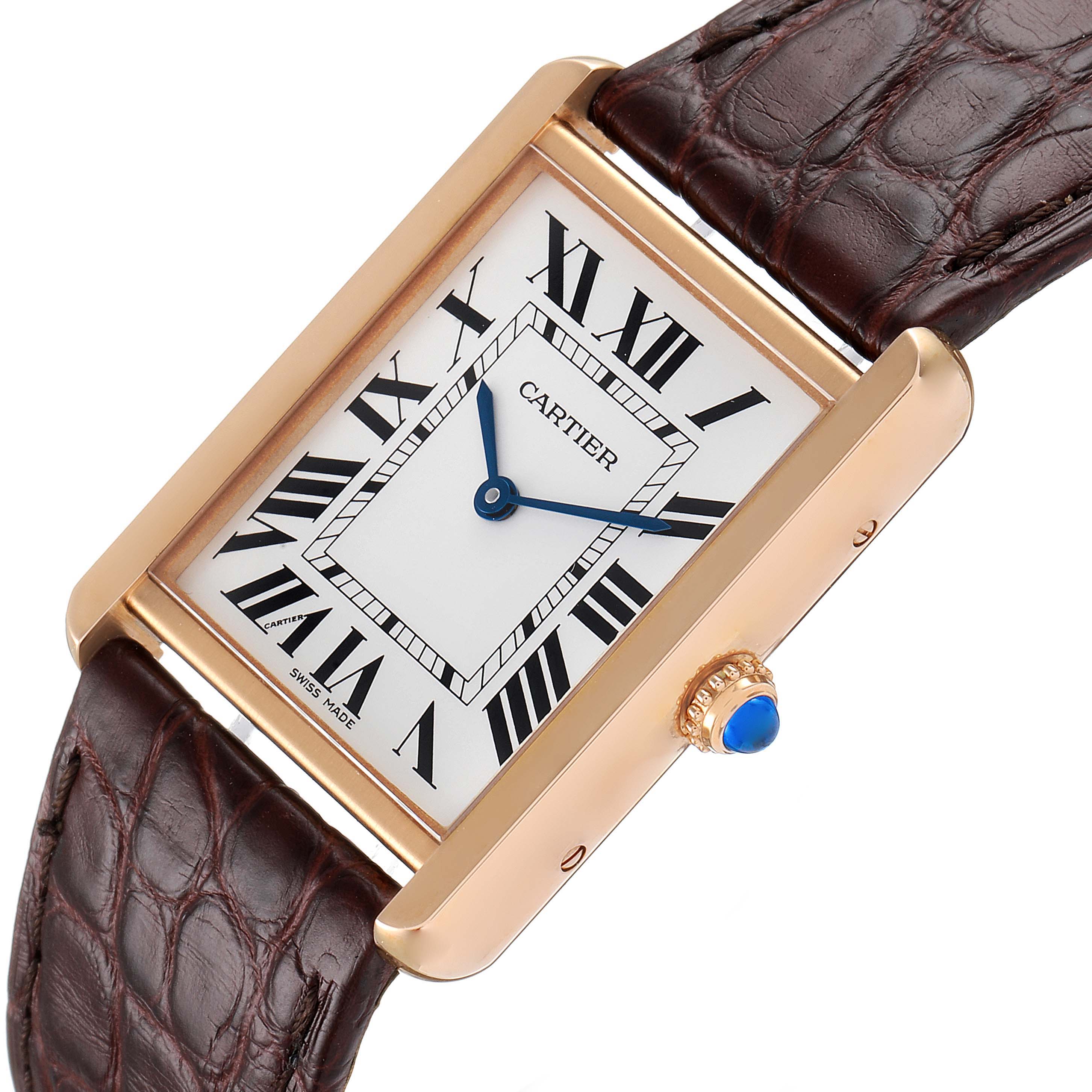 The image shows a Cartier Tank Solo W5200025 Men
s Rose Gold Silver Dial W5200025 Men
s Rose Gold Silver Dial watch at an angled top-down view, highlighting the face, bezel, crown, and leather strap.