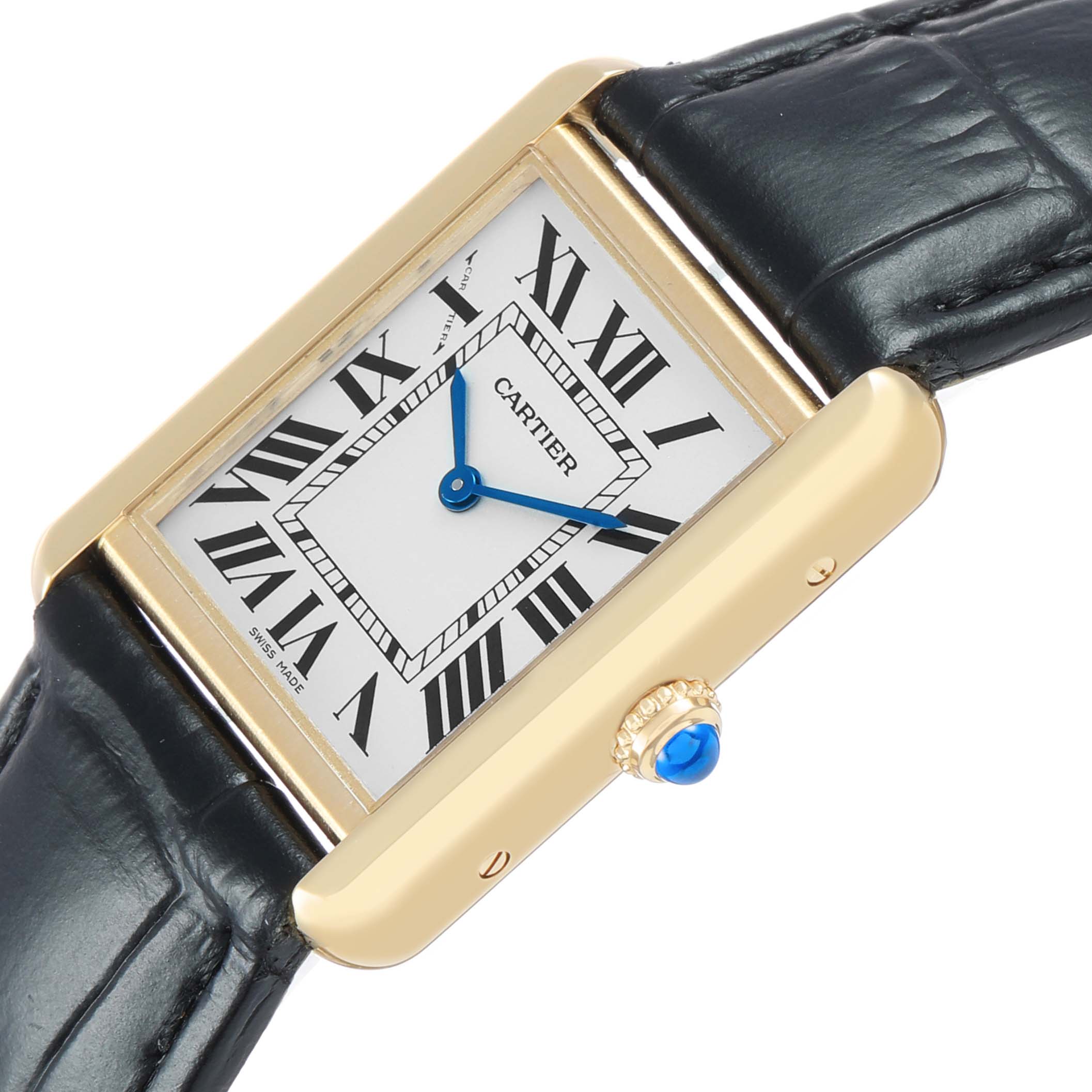 The Cartier Tank Solo W1018755 Women's Yellow Gold Silver Dial watch is displayed at an angle, showing the front, side, and crown with a blue cabochon.