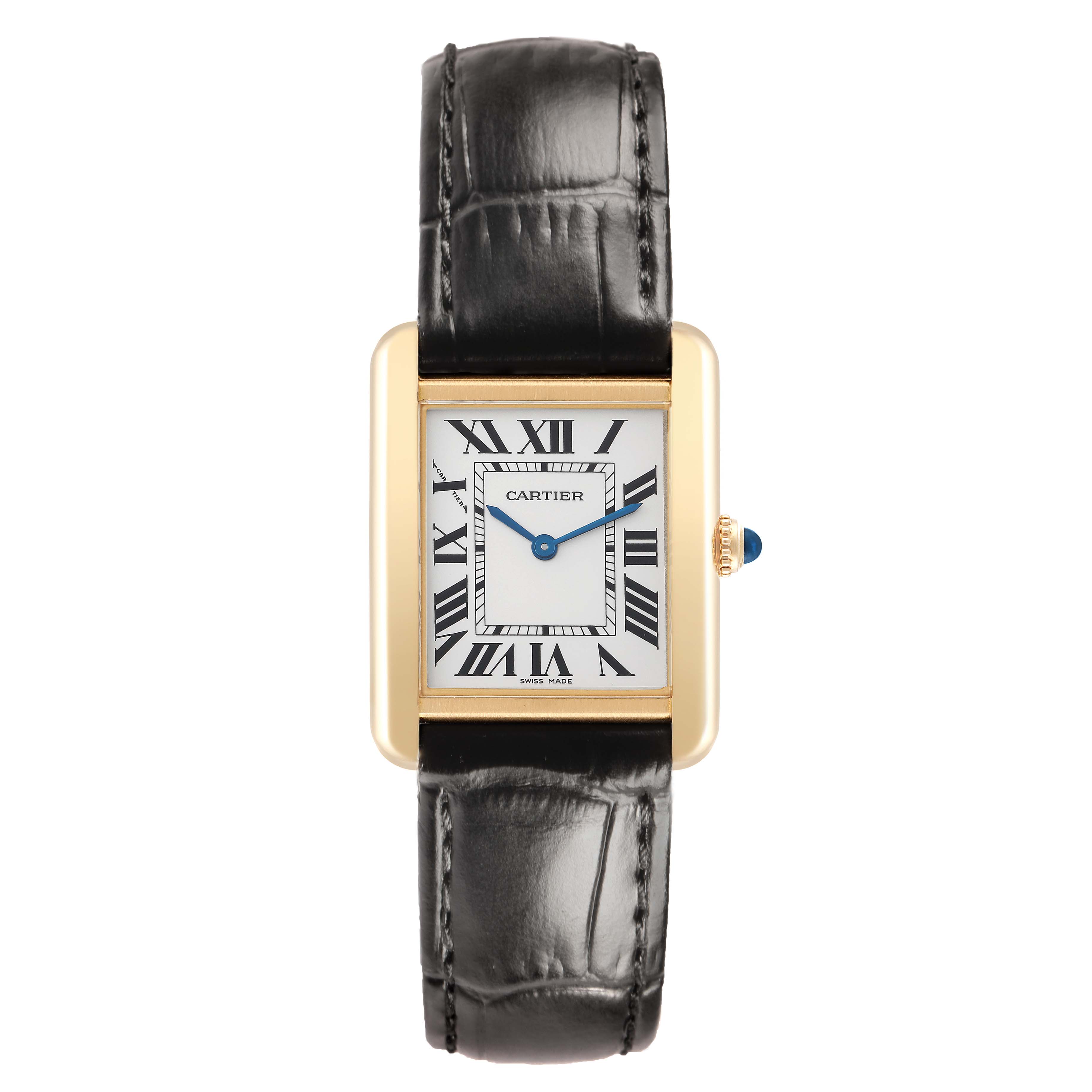 The Cartier Tank Solo W1018755 Women's Yellow Gold Silver Dial is shown from a front angle, displaying its rectangular face, gold case, black leather strap, and blue hands.