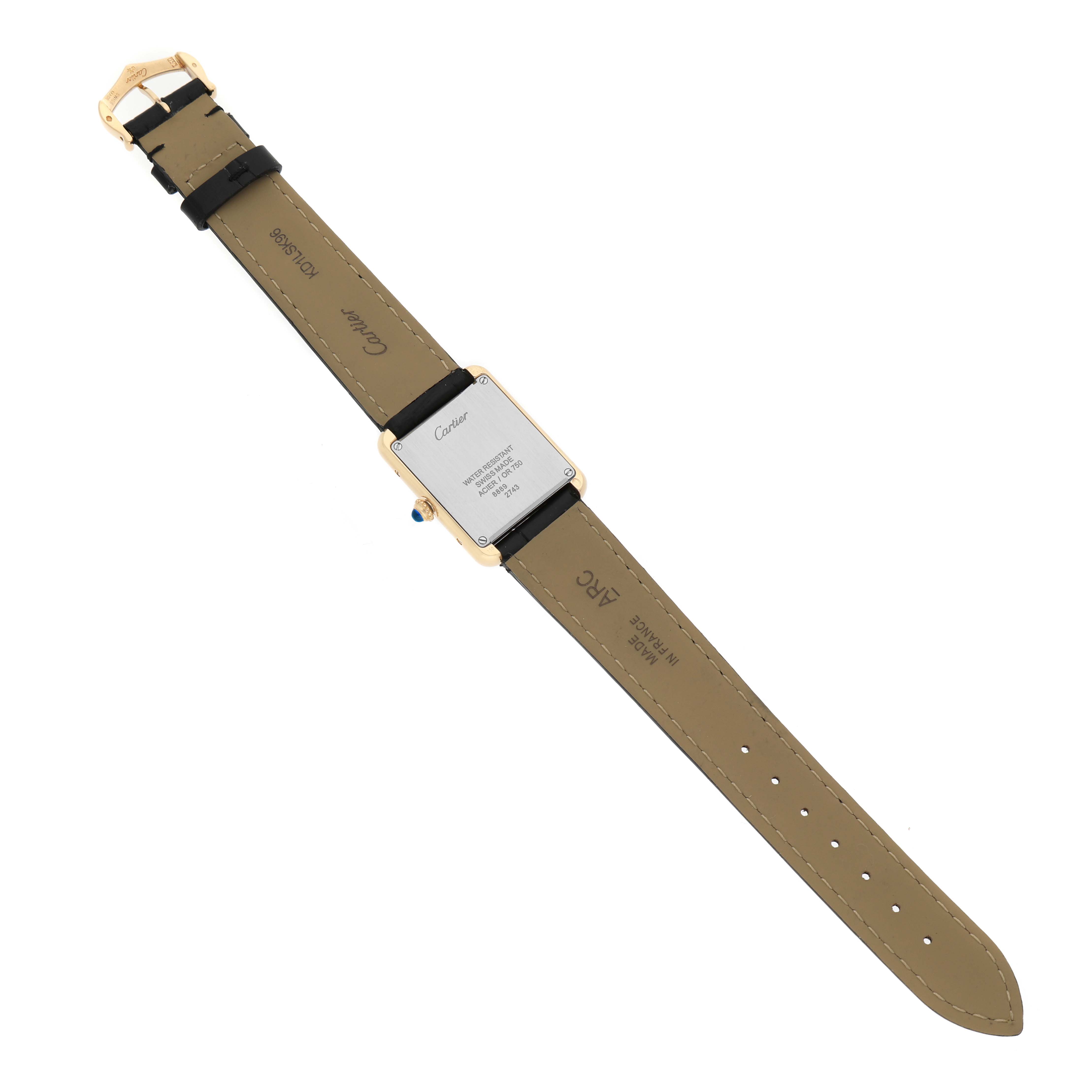 The Cartier Tank Solo W1018755 Women's Yellow Gold Silver Dial watch is shown from the back, displaying the case back and leather strap details.