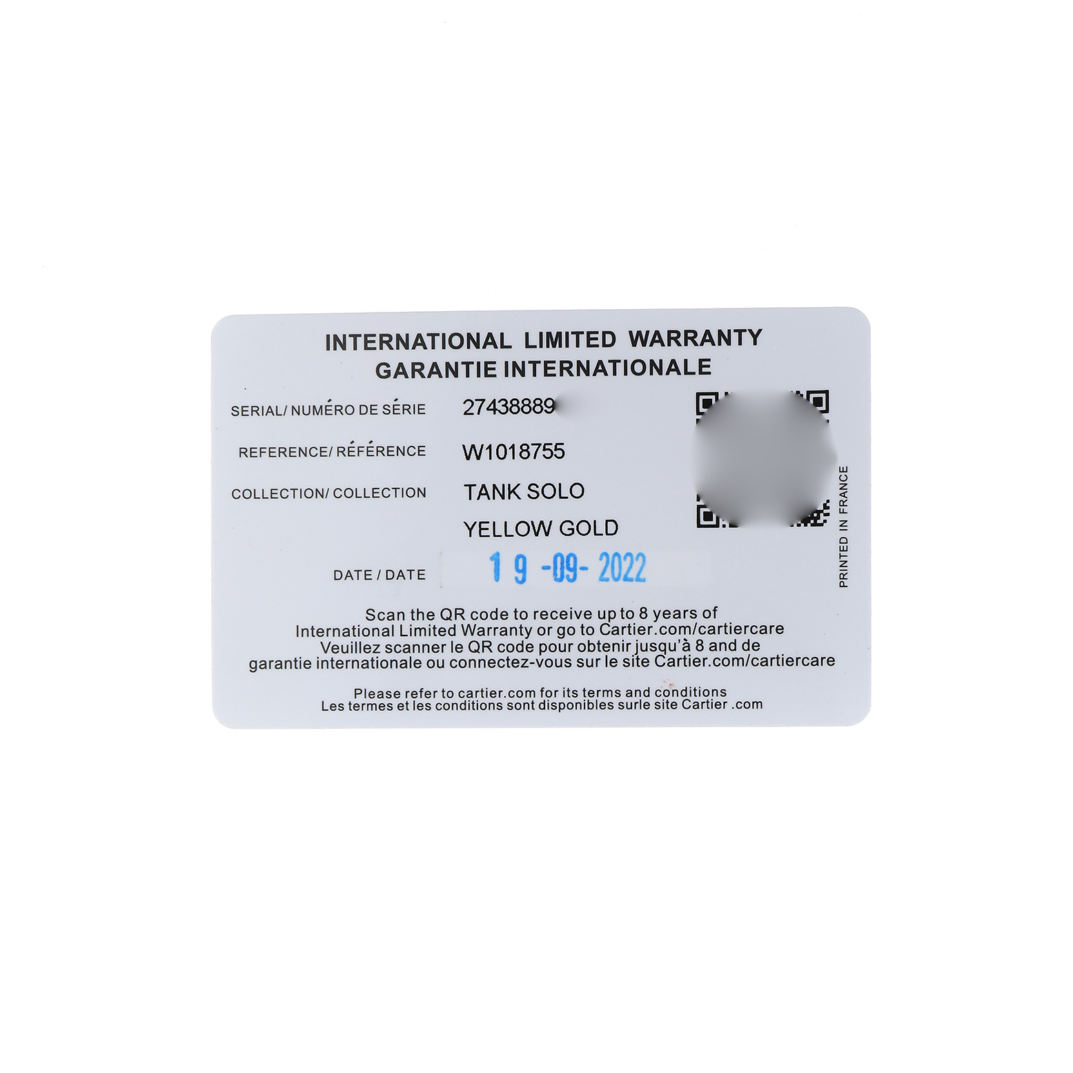 This image shows the international warranty card for a Cartier Tank Solo W1018755 Women's Yellow Gold Silver Dial model watch.