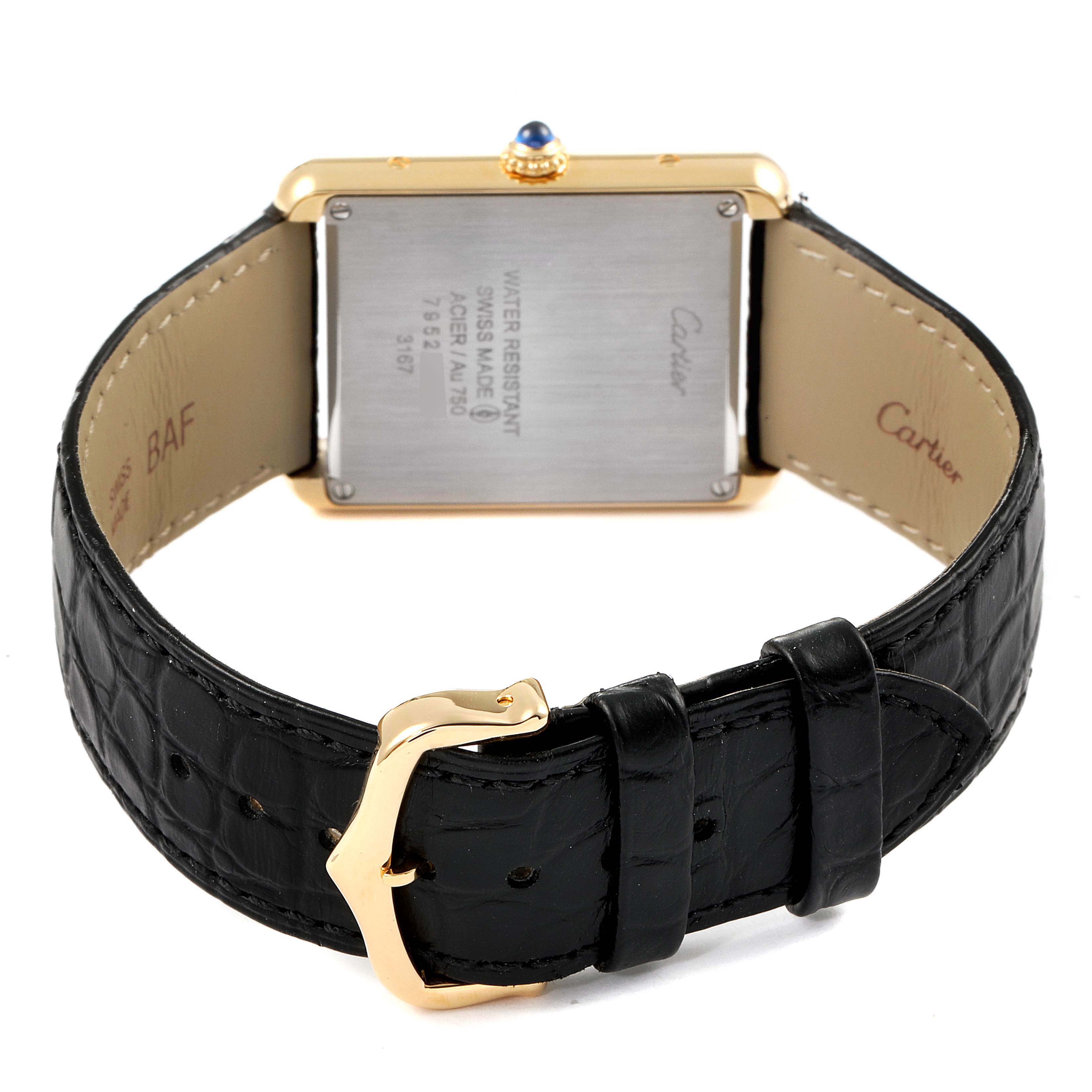 This image shows the back view of a Cartier Tank Solo W5200004 Men's Yellow Gold Silver Dial W5200004 Men's Yellow Gold Silver Dial watch, highlighting the case, strap, and buckle.