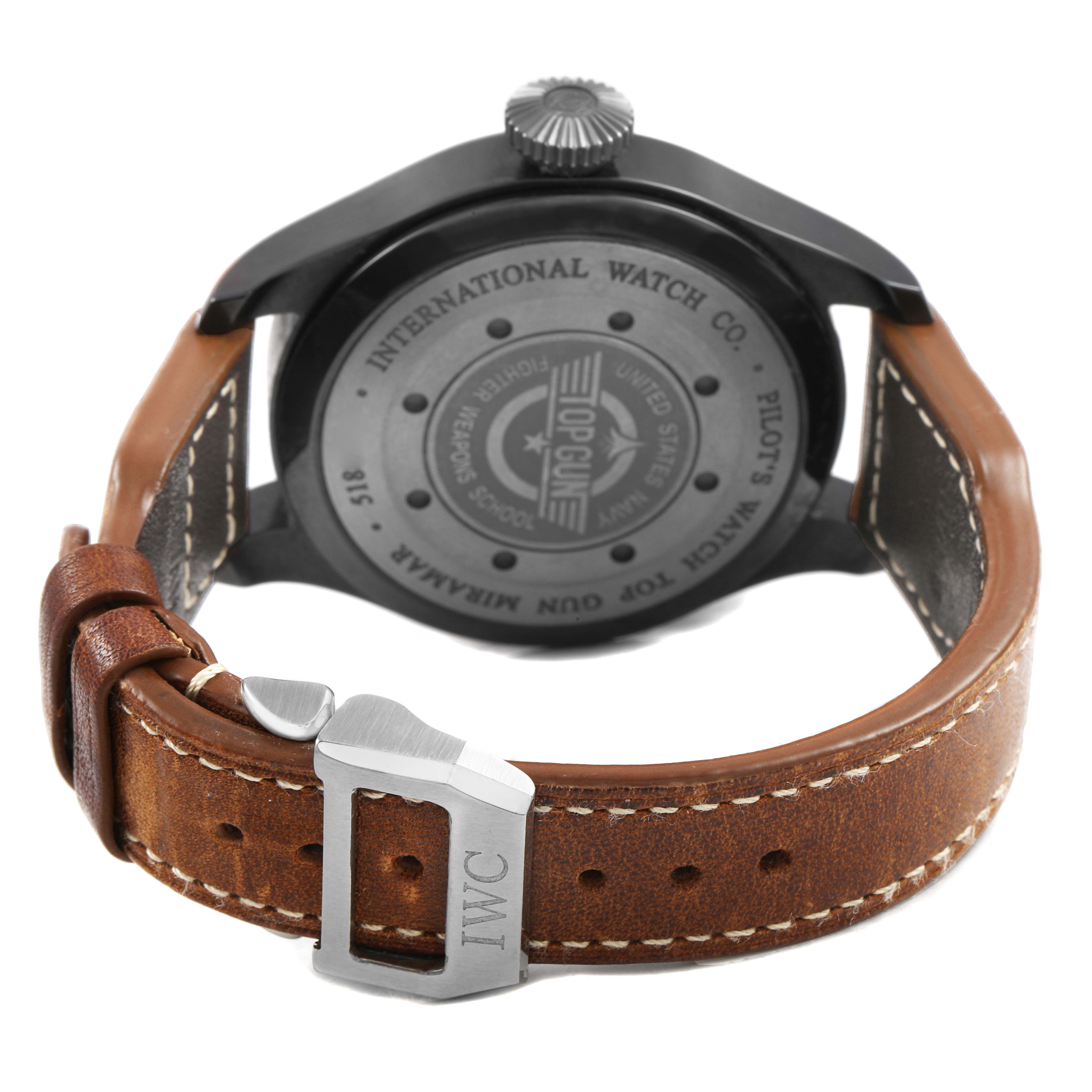 The image shows the back view of an IWC Pilot IW501902 Men's Ceramic Grey Dial model watch, highlighting the case back, crown, and leather strap with buckle.
