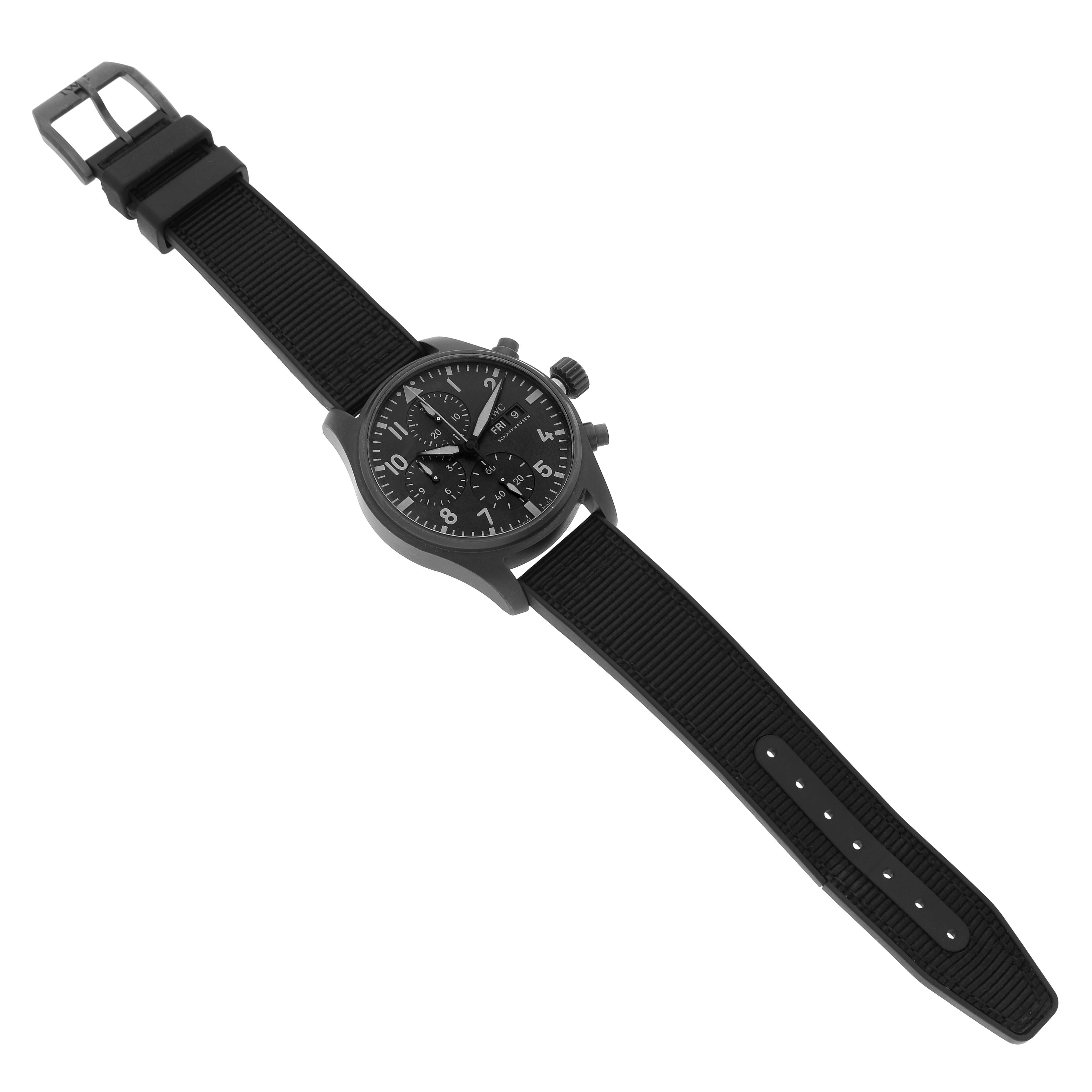 The IWC Pilot IW388106 Men's Titanium Black Dial watch is shown at a slight angle, displaying the face, crown, pushers, and fully extended strap.