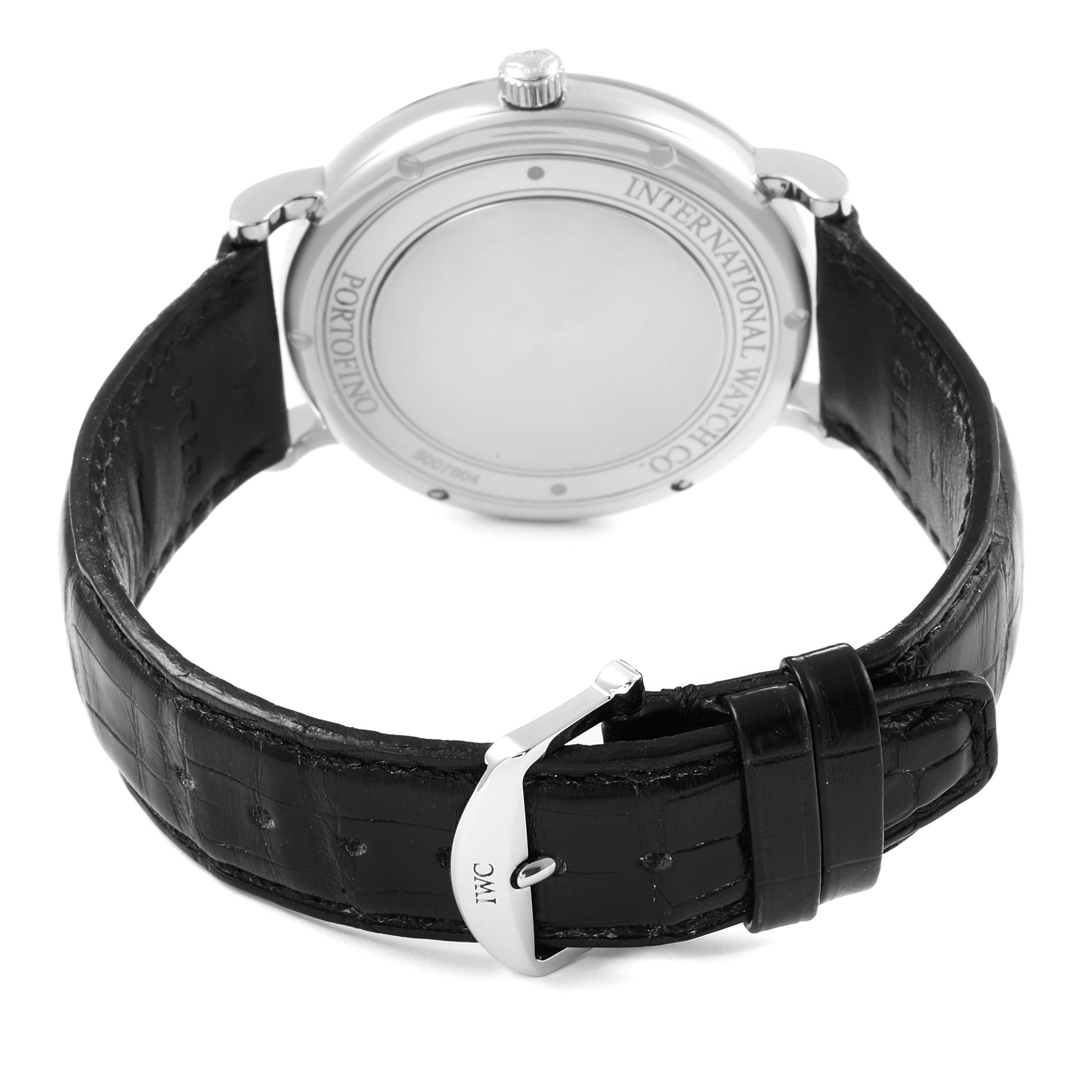 The image shows the back and strap of an IWC Portofino IW356502 Men
s Stainless Steel Silver Dial IW356502 Men
s Stainless Steel Silver Dial watch, with focus on the case back and leather strap with a buckle.